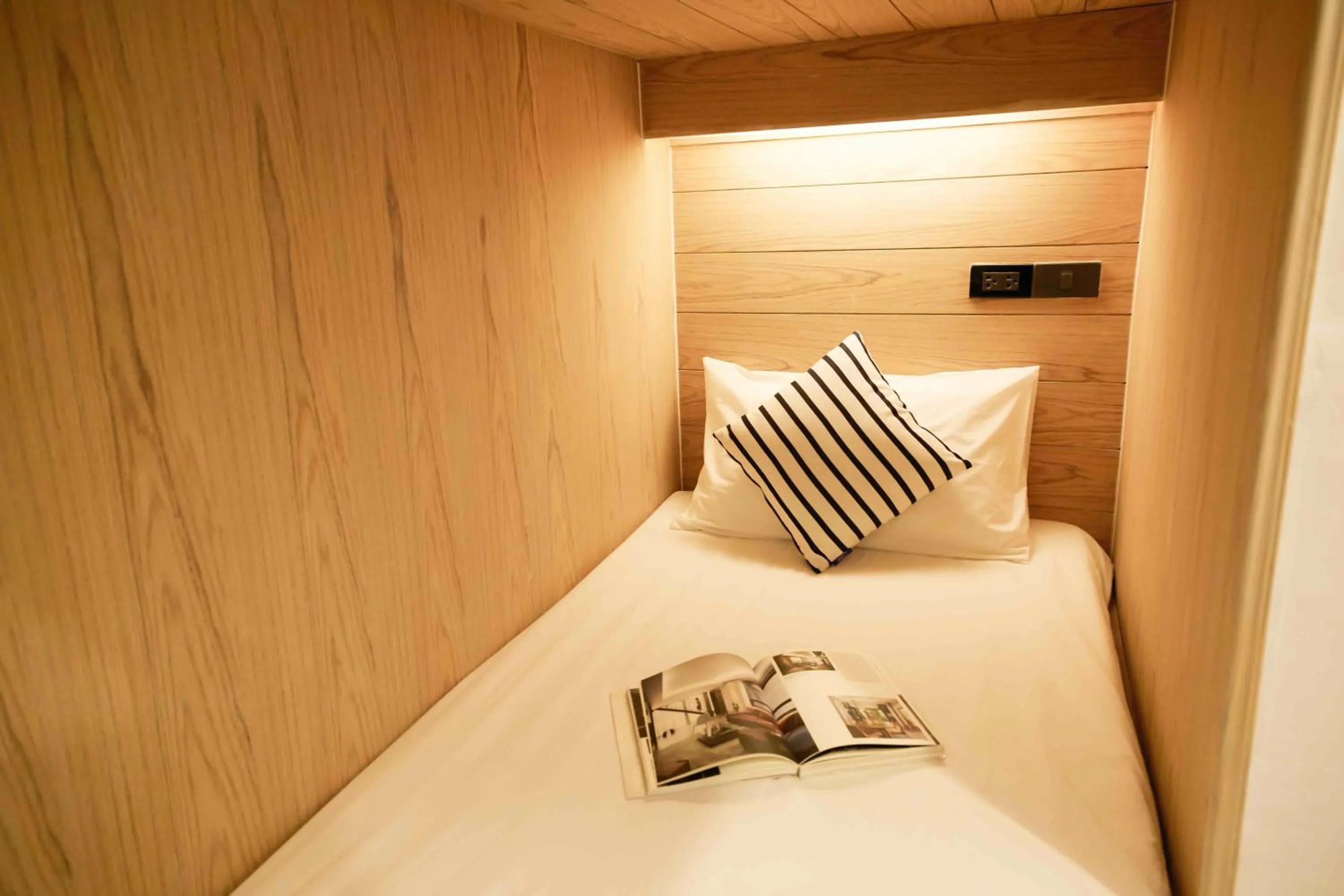 Bed in Vann Bangkok Boutique House