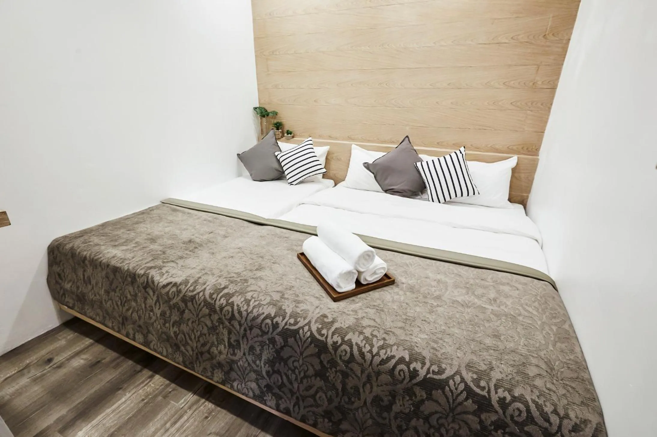 Bed in Vann Bangkok Boutique House