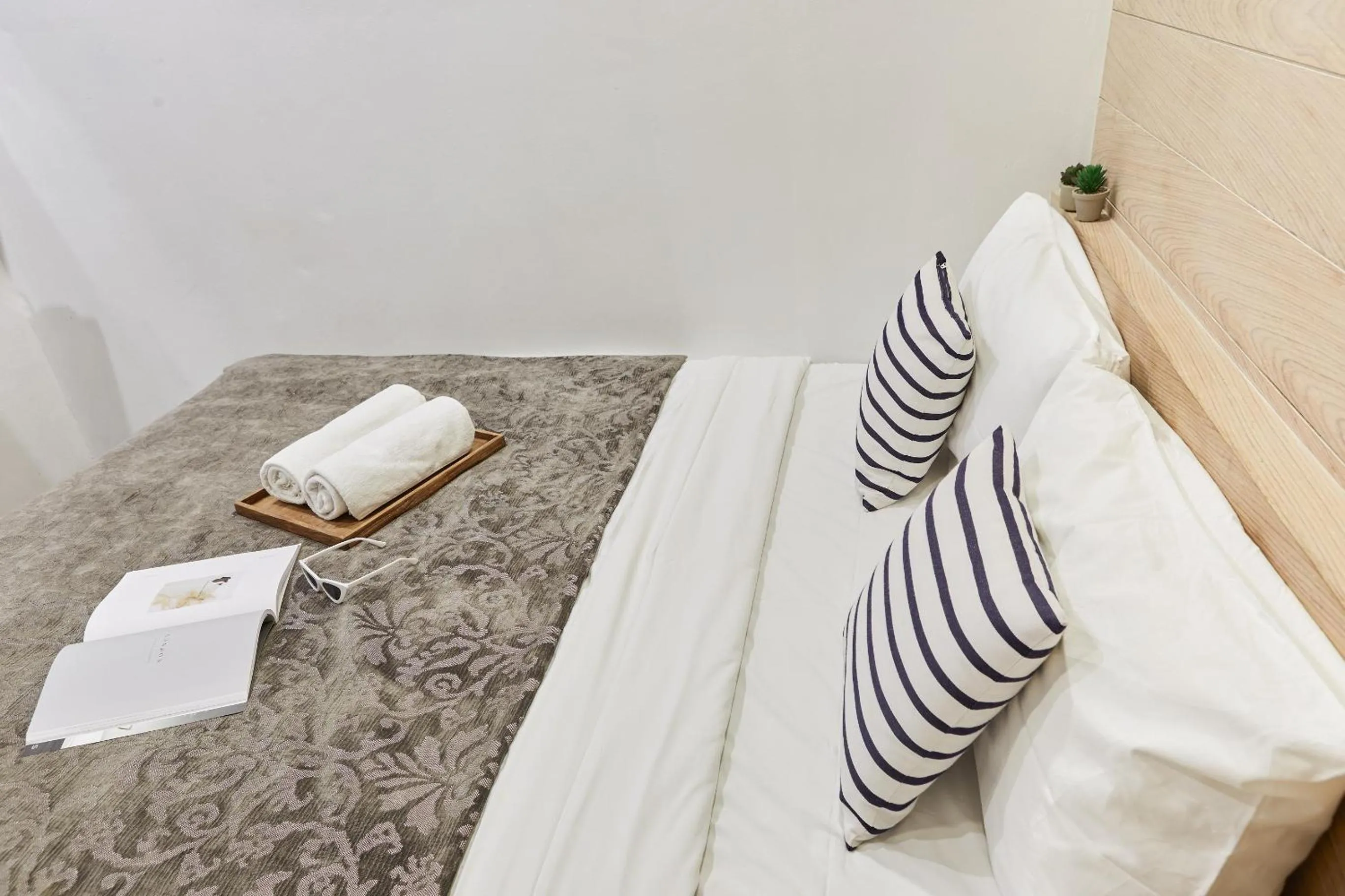 Bed in Vann Bangkok Boutique House