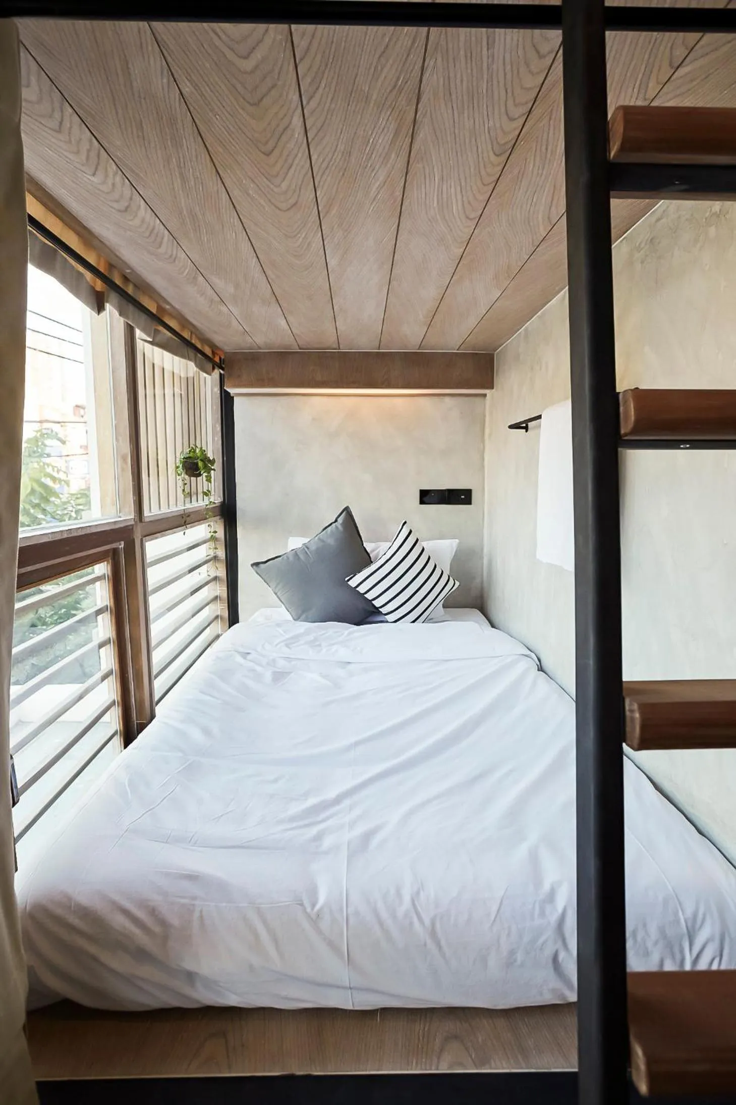 Bed in Vann Bangkok Boutique House