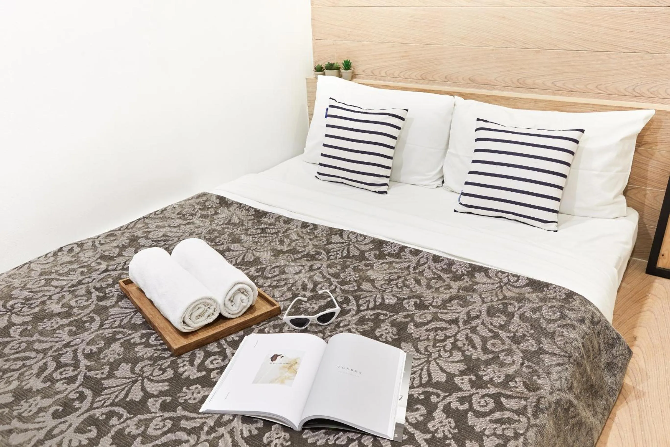 Bed in Vann Bangkok Boutique House