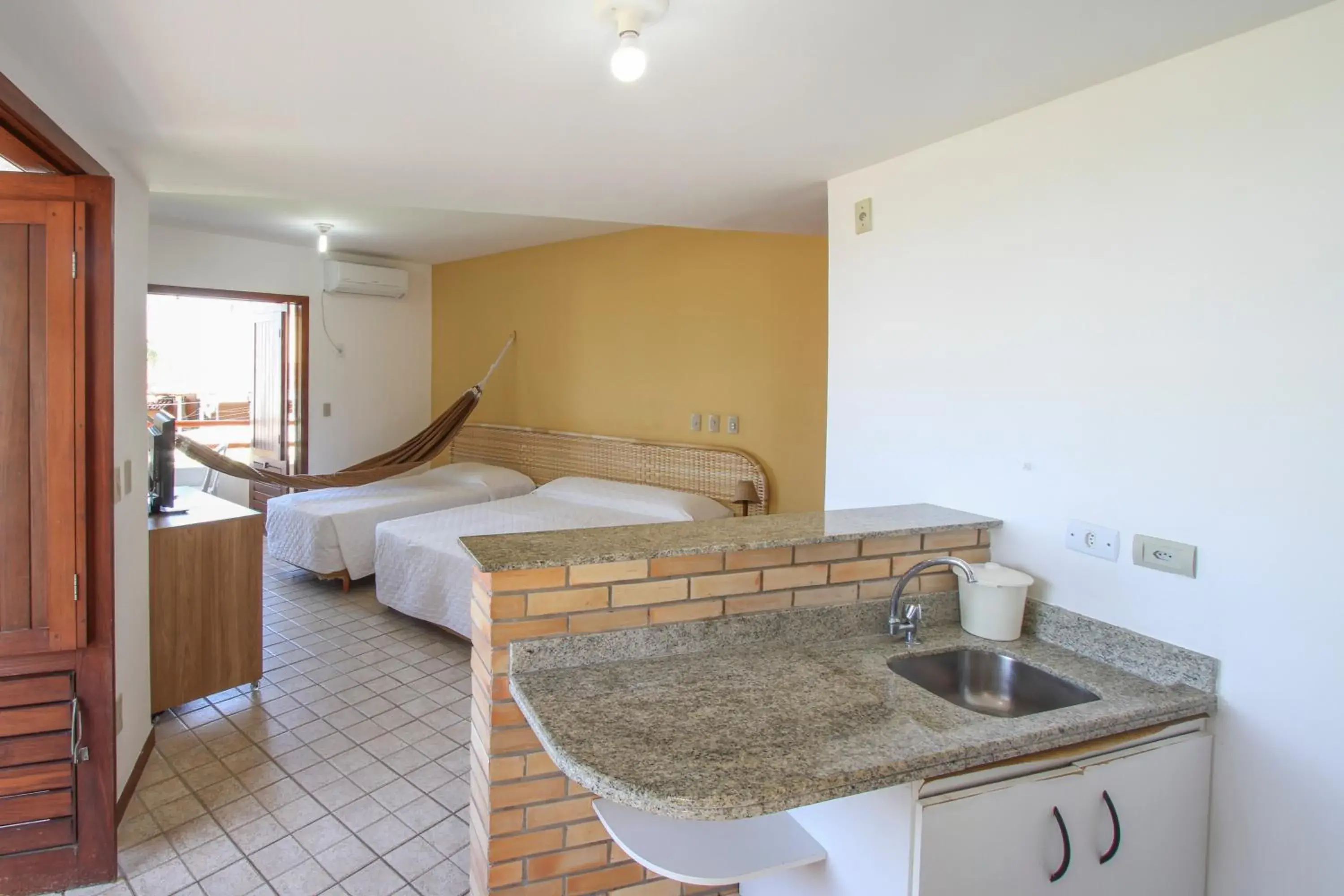 Photo of the whole room, Bed in Marambaia Apart Hotel Photo of the whole room, Bed in Marambaia Apart Hotel