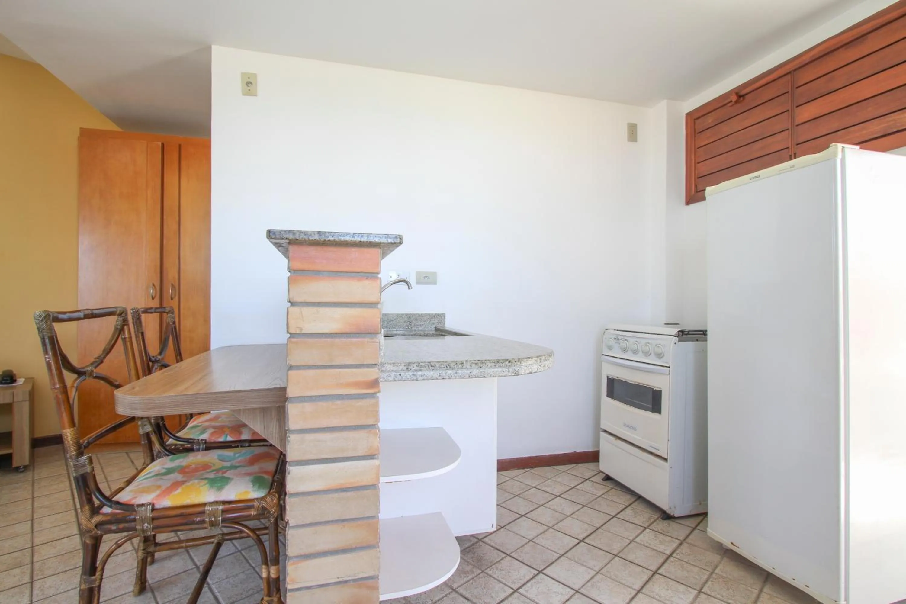 Photo of the whole room in Marambaia Apart Hotel