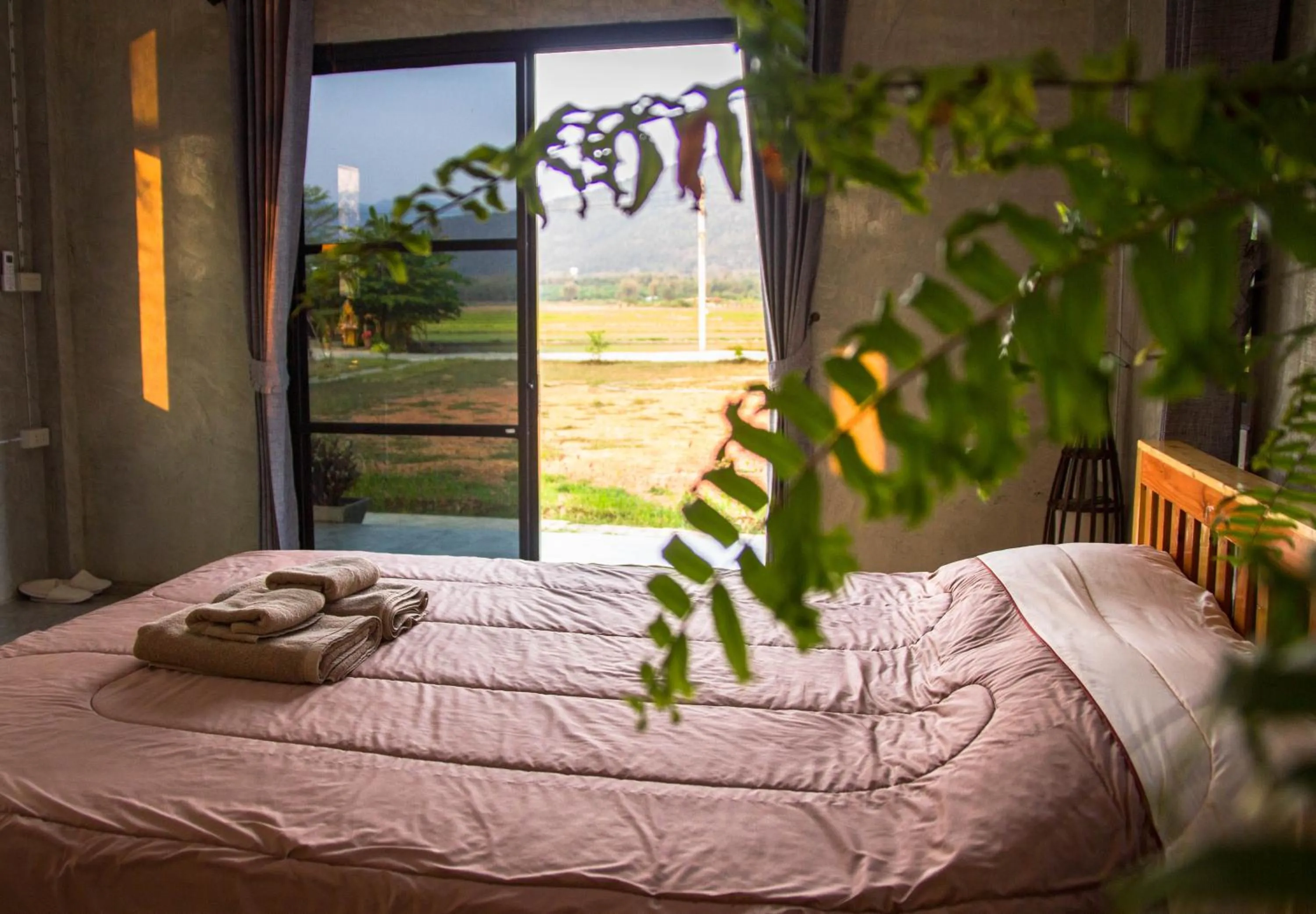 Photo of the whole room, Bed in Santitham Home Farm Stay