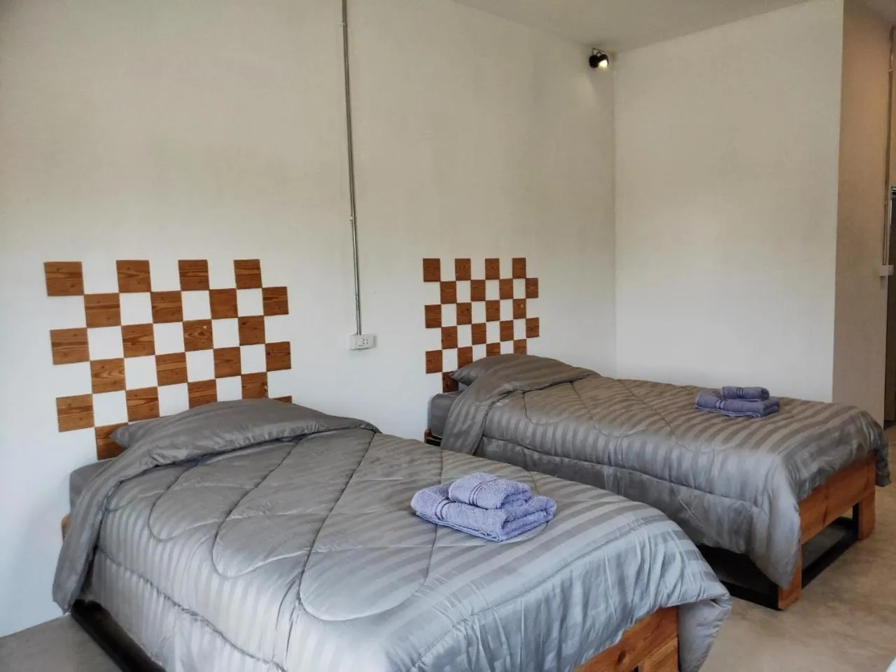 Bed in Santitham Home Farm Stay