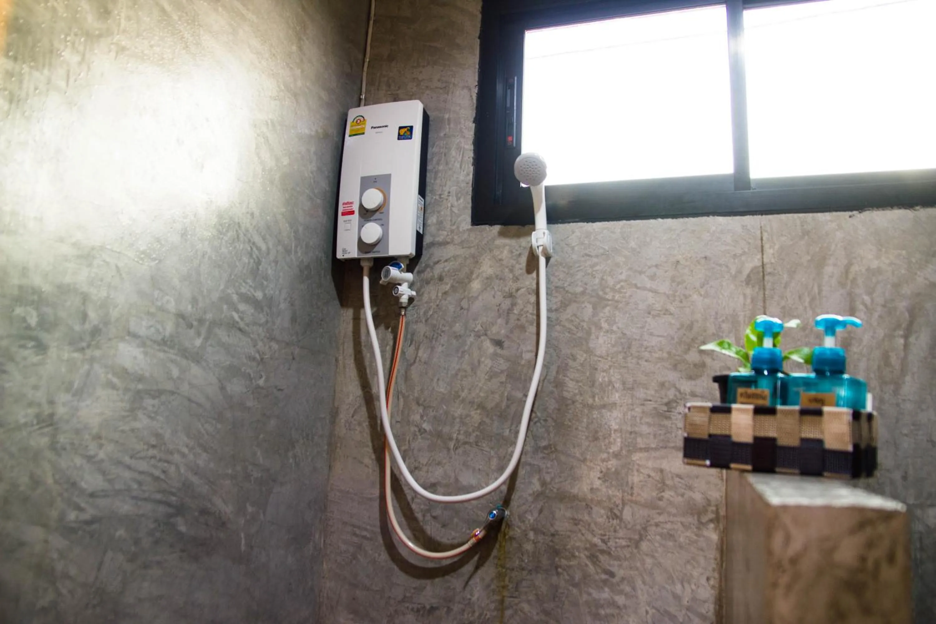 Photo of the whole room in Santitham Home Farm Stay