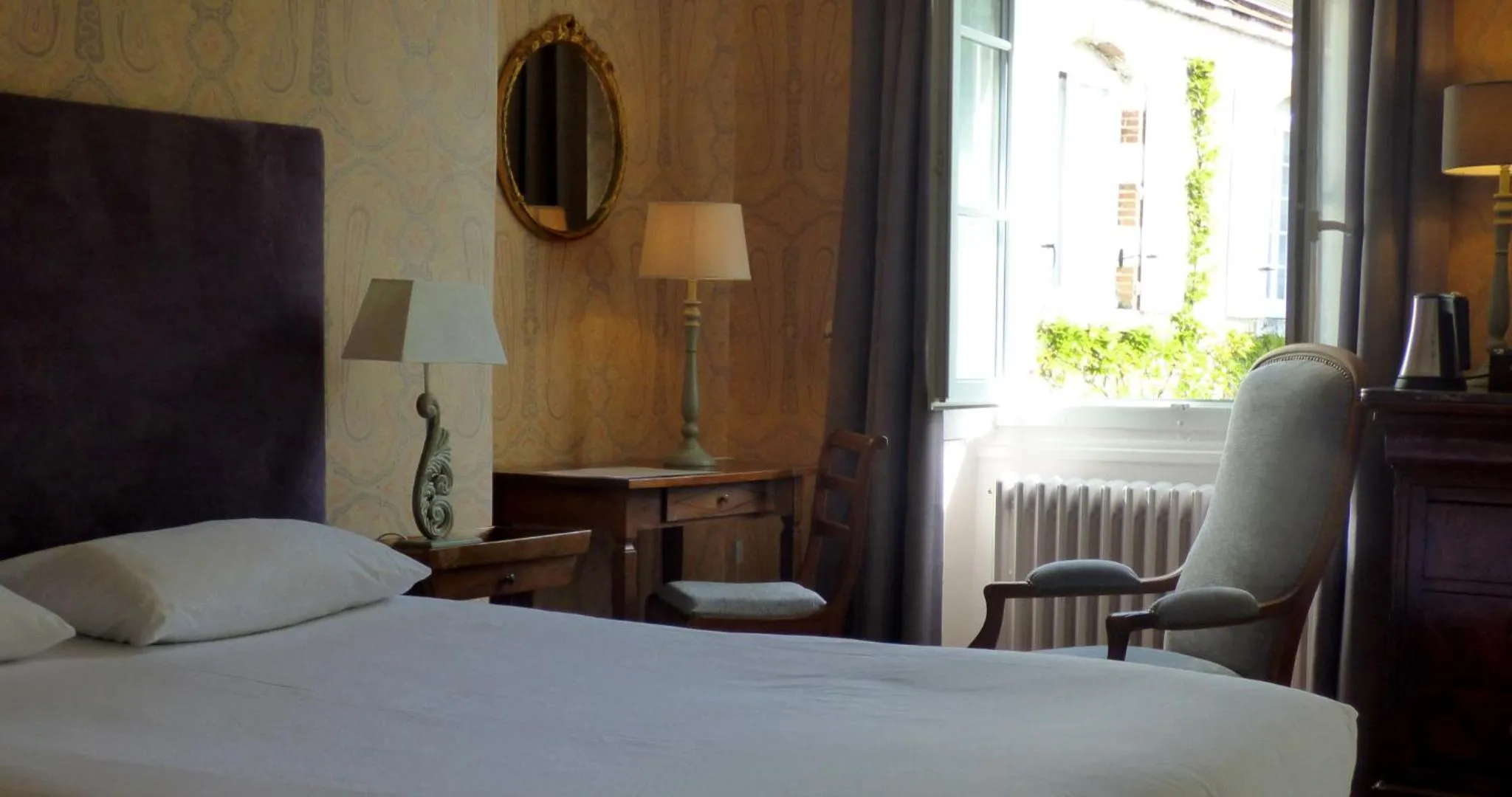 Bed in Hôtel La Tonnellerie