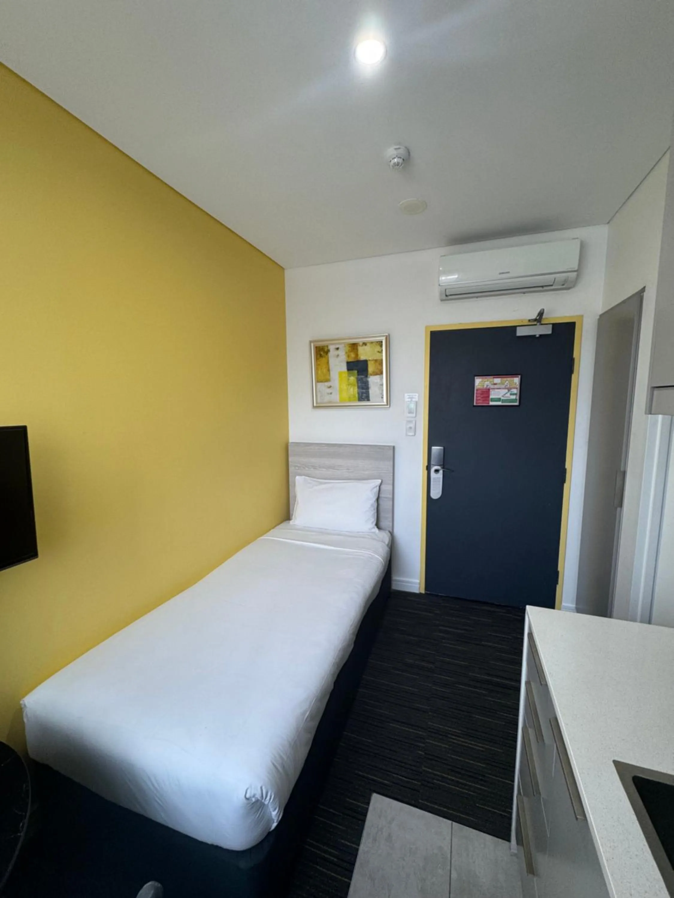 Bedroom, Bed in Value Suites Green Square