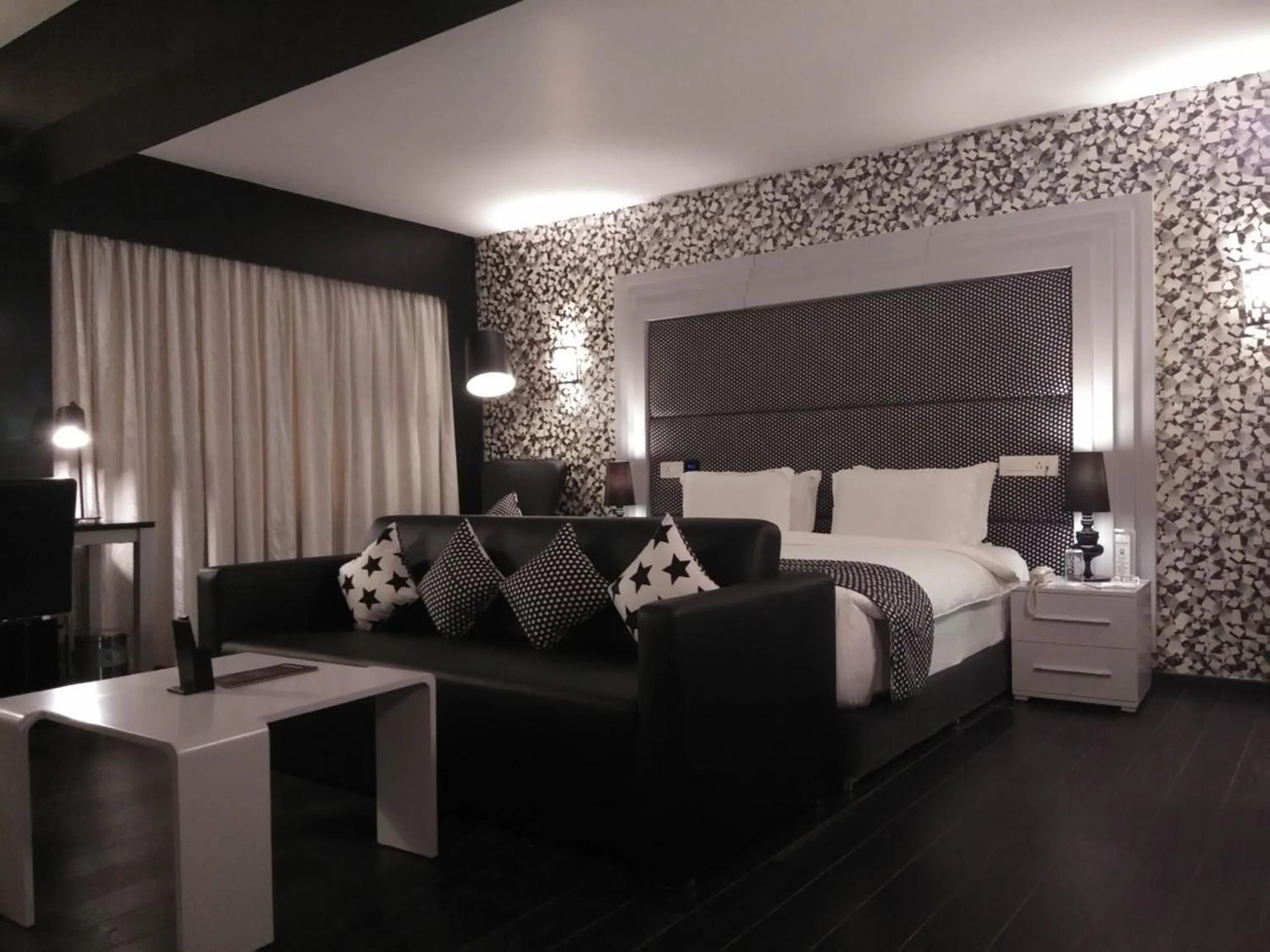 Bed in Hotel Oxina Lygon