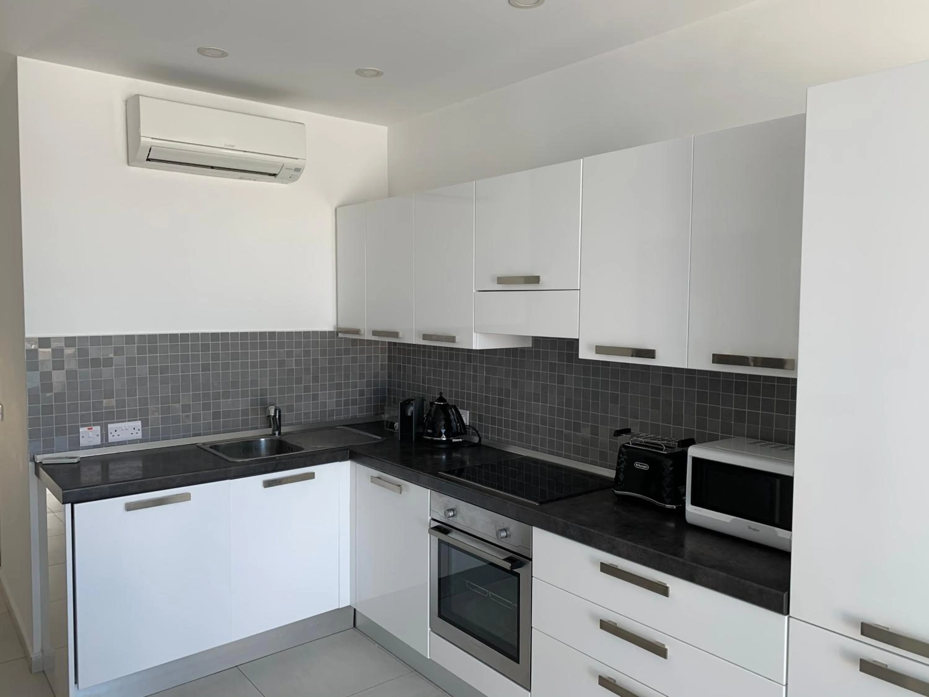 Kitchen or kitchenette in Sea View Penthouse Mellieha Bay
