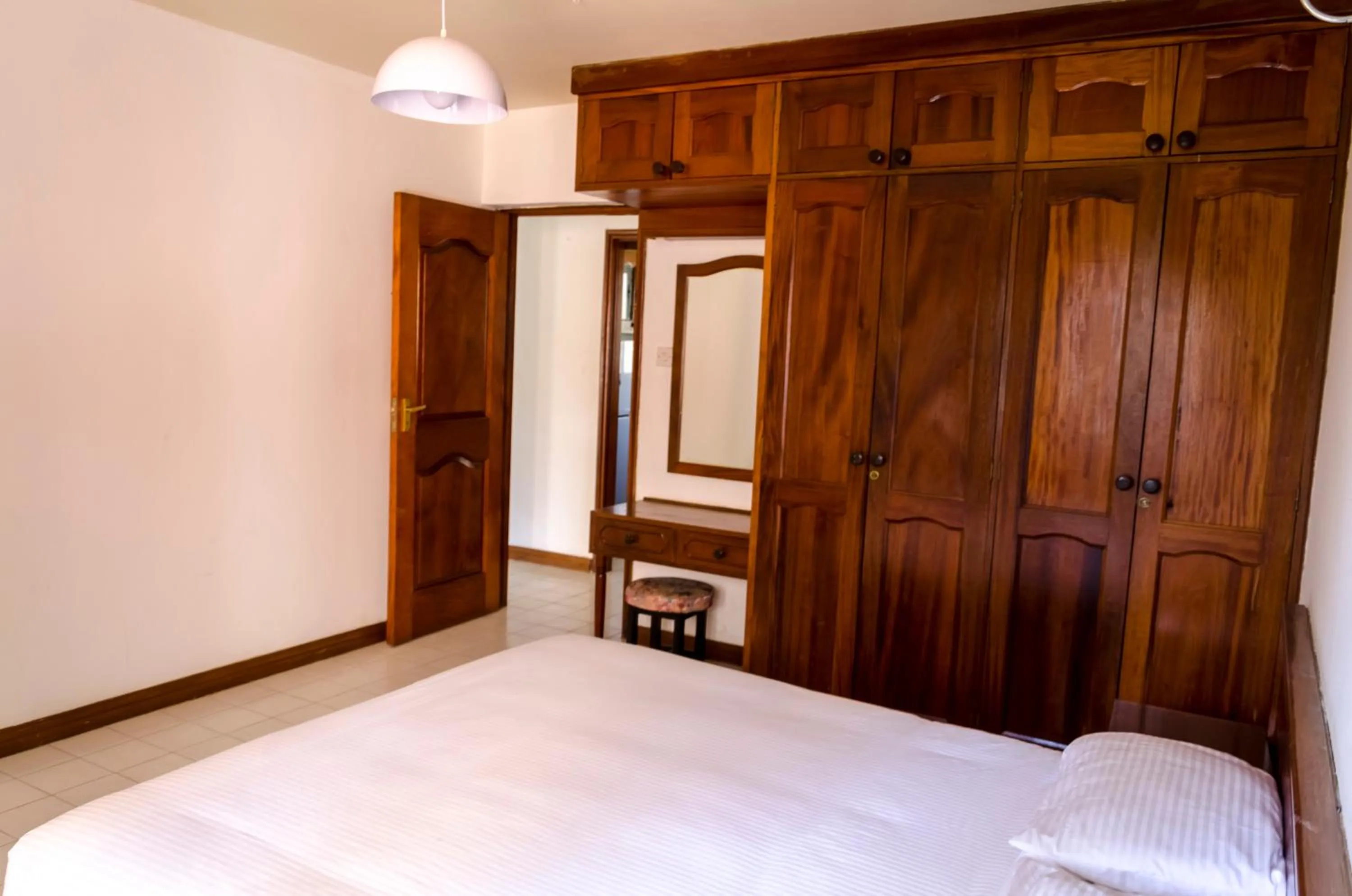 Bed in Golf Course Apartments