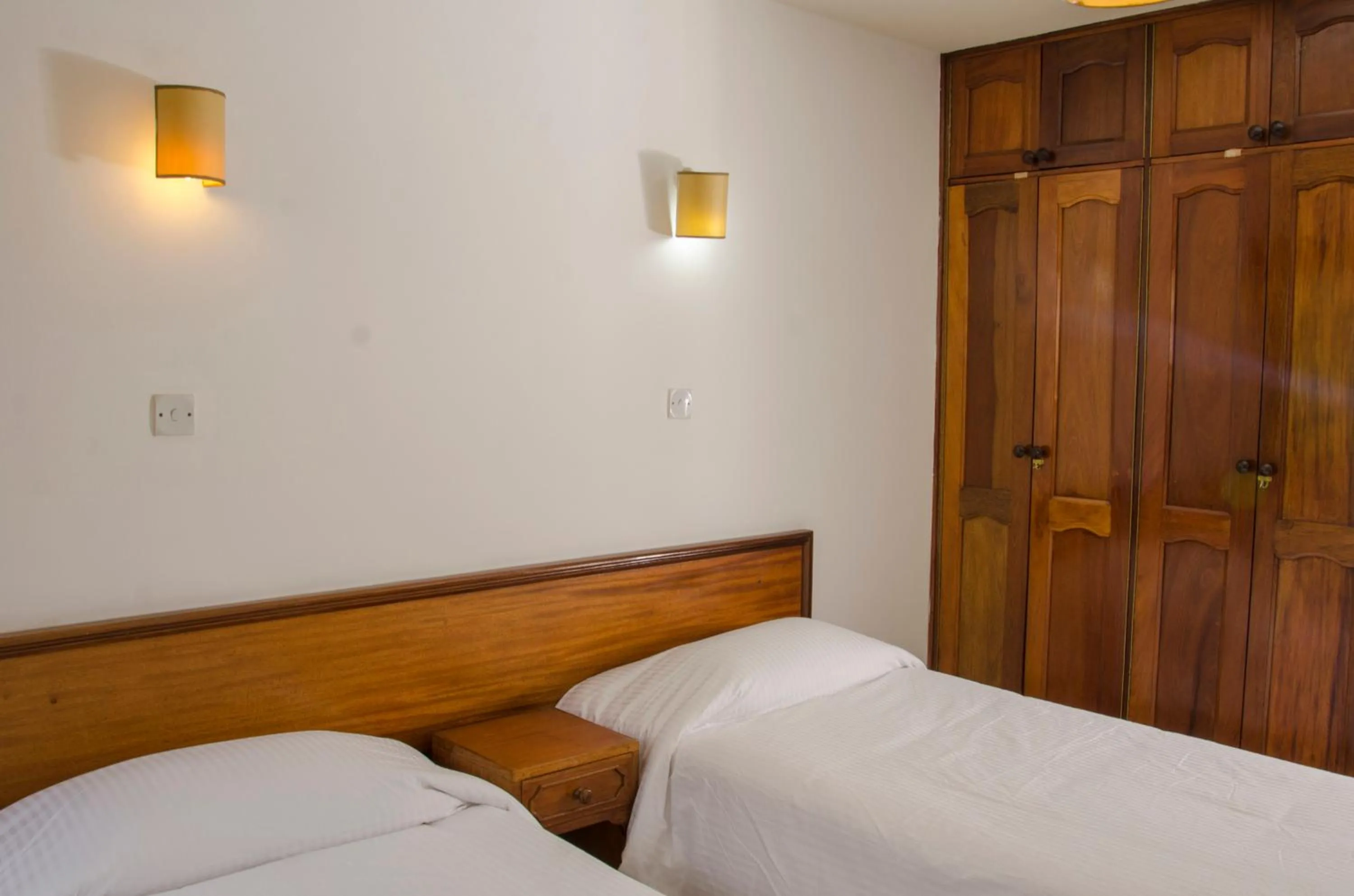 Bed in Golf Course Apartments