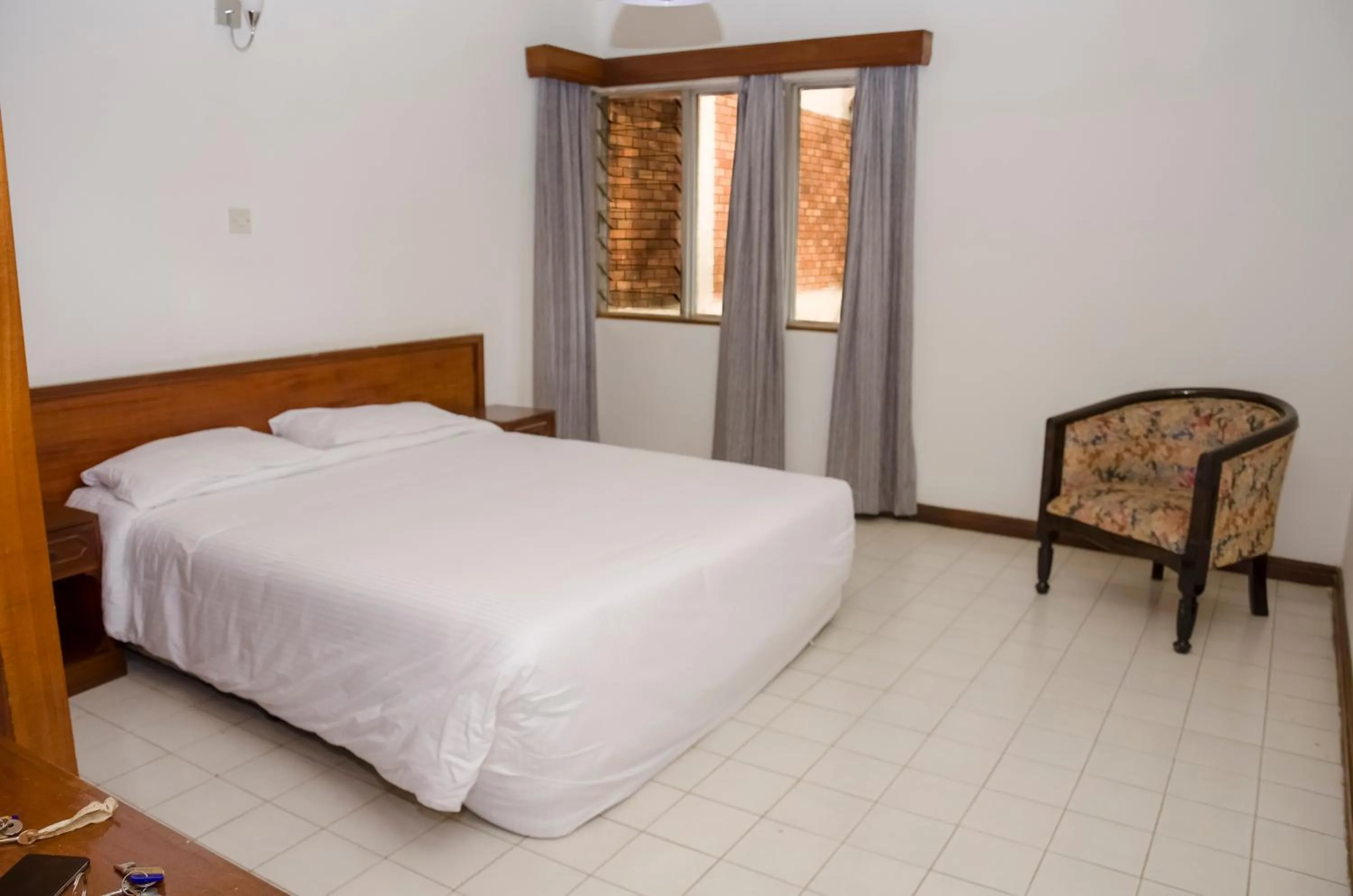 Bed in Golf Course Apartments