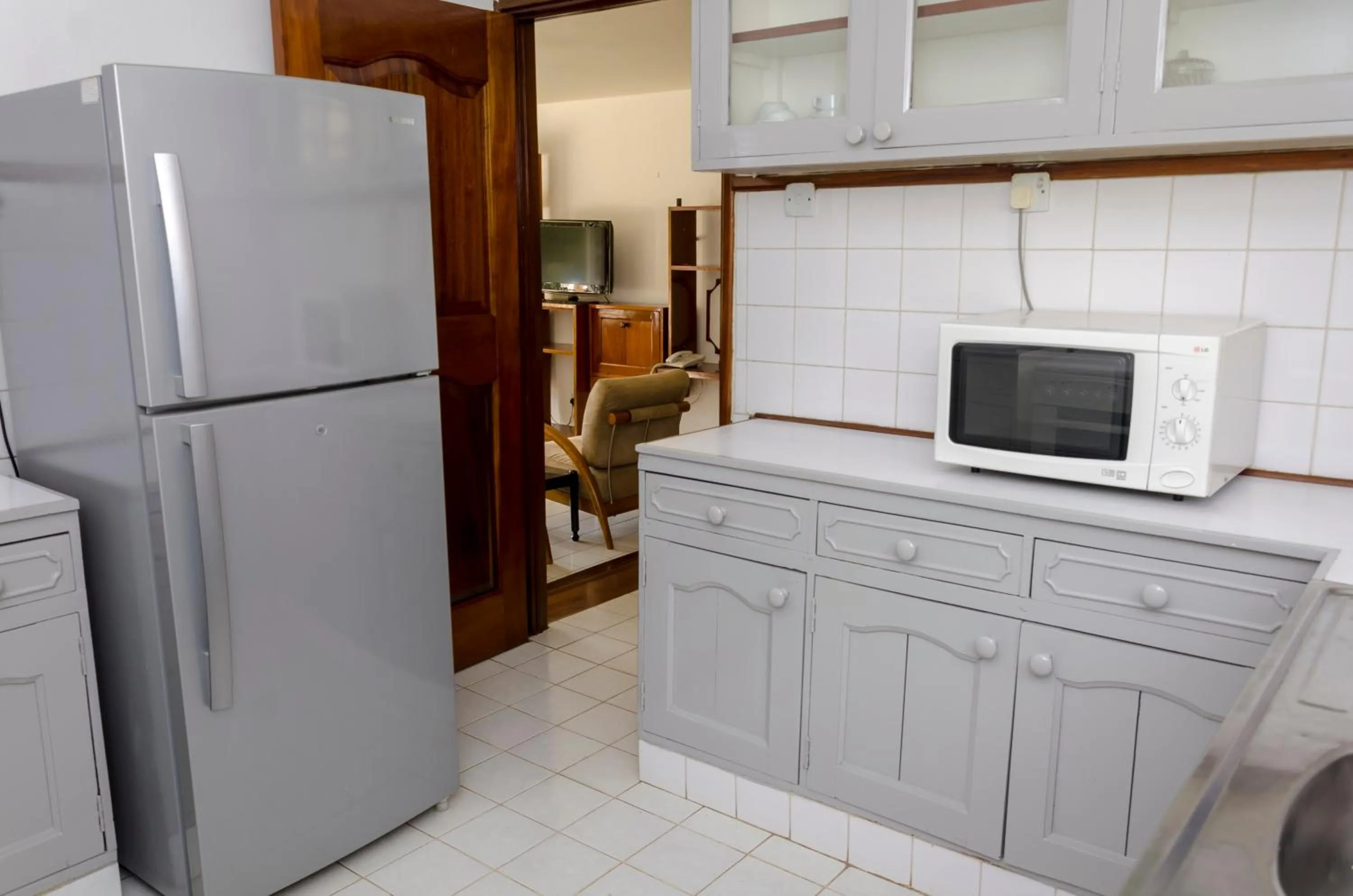 Kitchen or kitchenette in Golf Course Apartments
