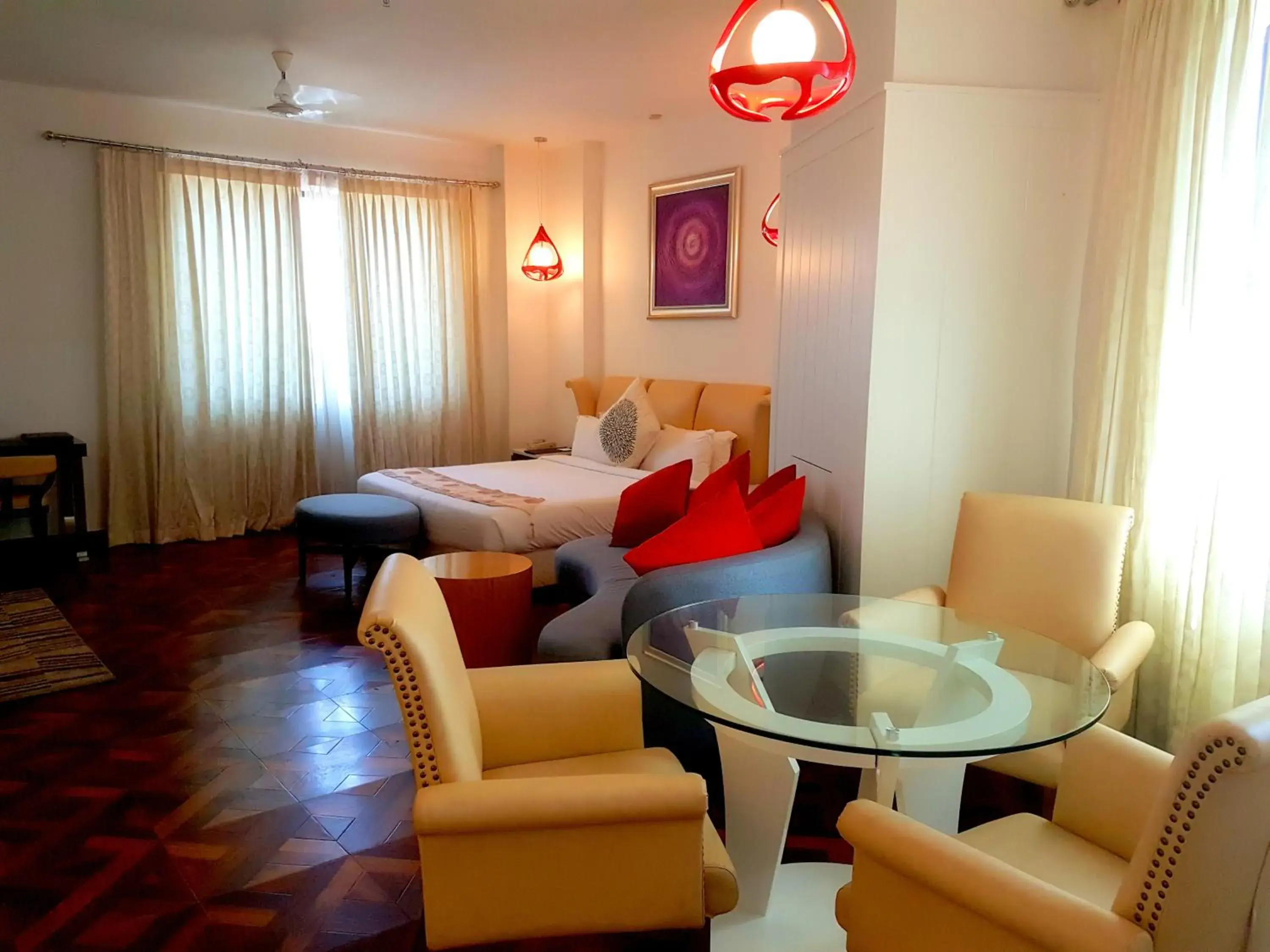 Living room, Bed in Pal Heights Mantra Living room, Bed in Pal Heights Mantra