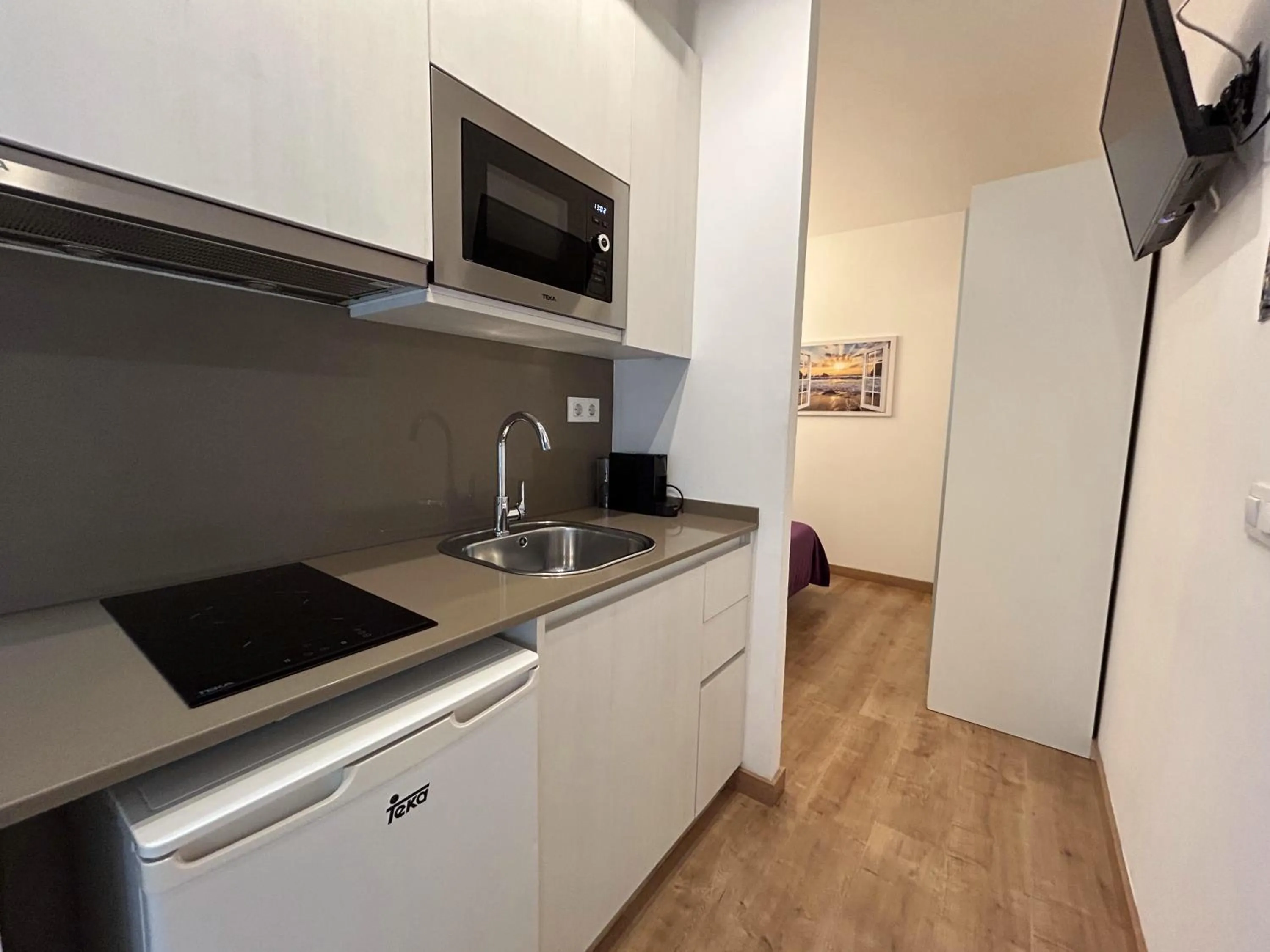 TV and multimedia in Apartahotel Baldiri