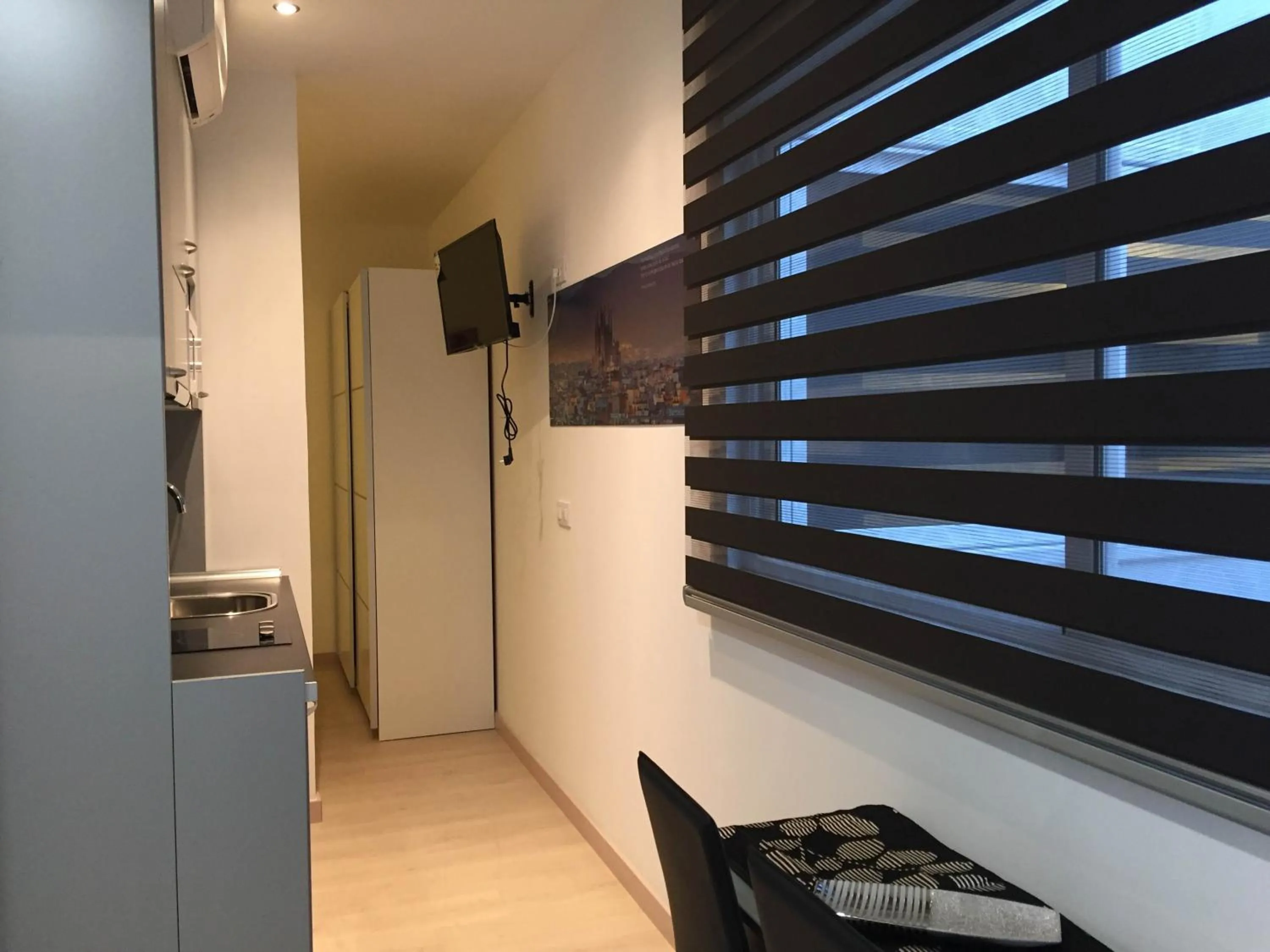 TV and multimedia in Apartahotel Baldiri