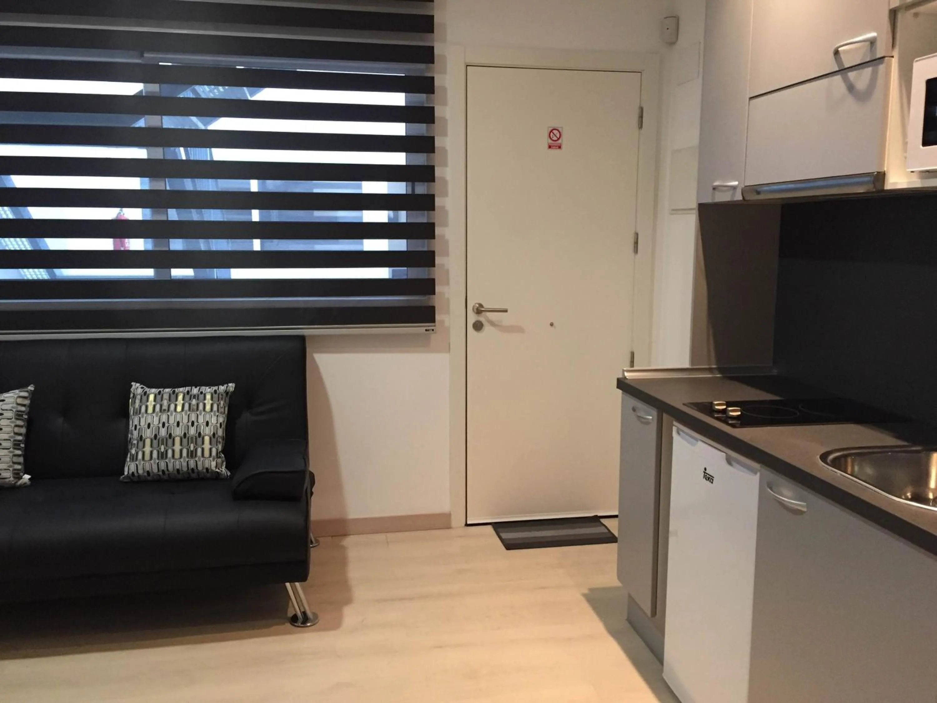 Kitchen or kitchenette in Apartahotel Baldiri