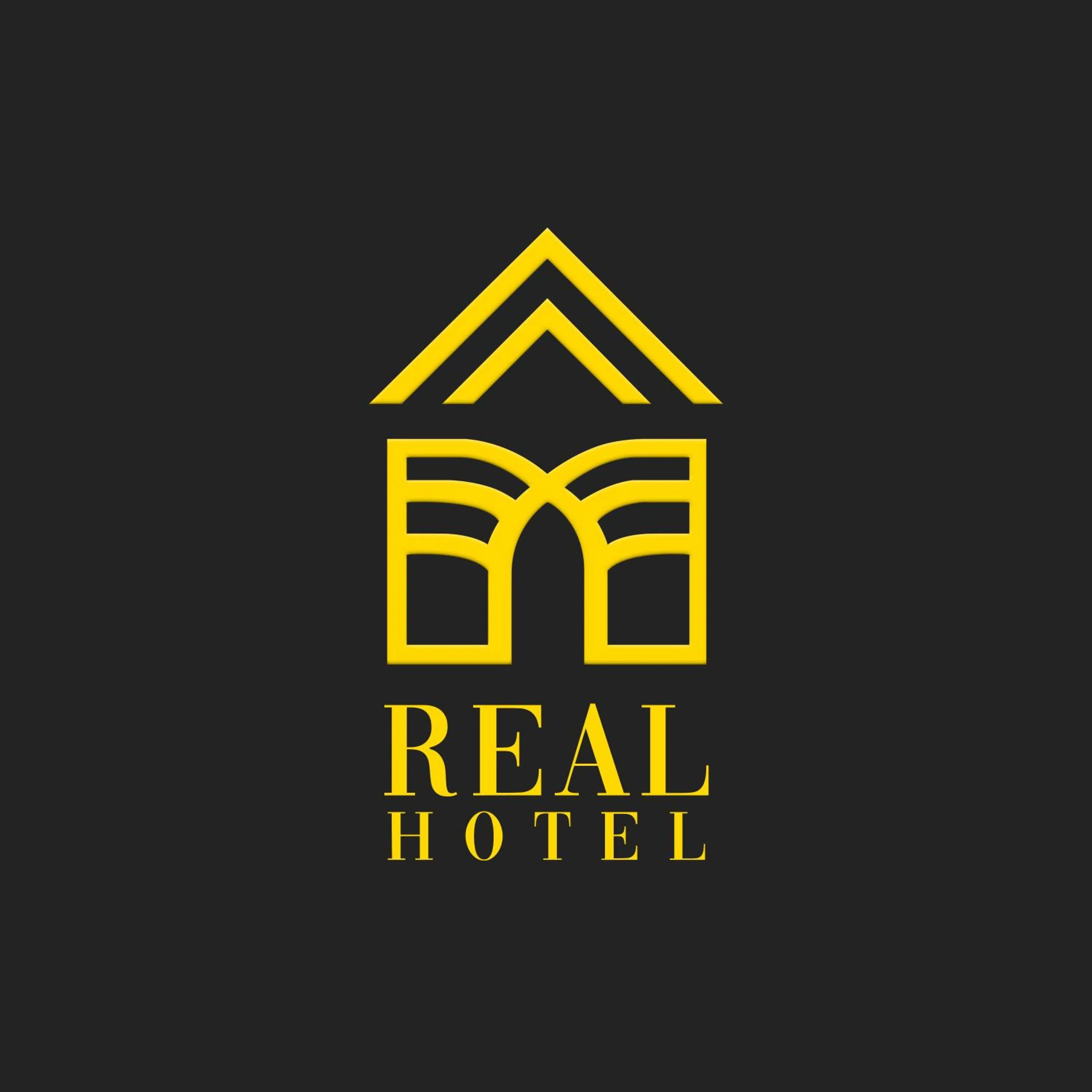 Property logo or sign in Hotel Real