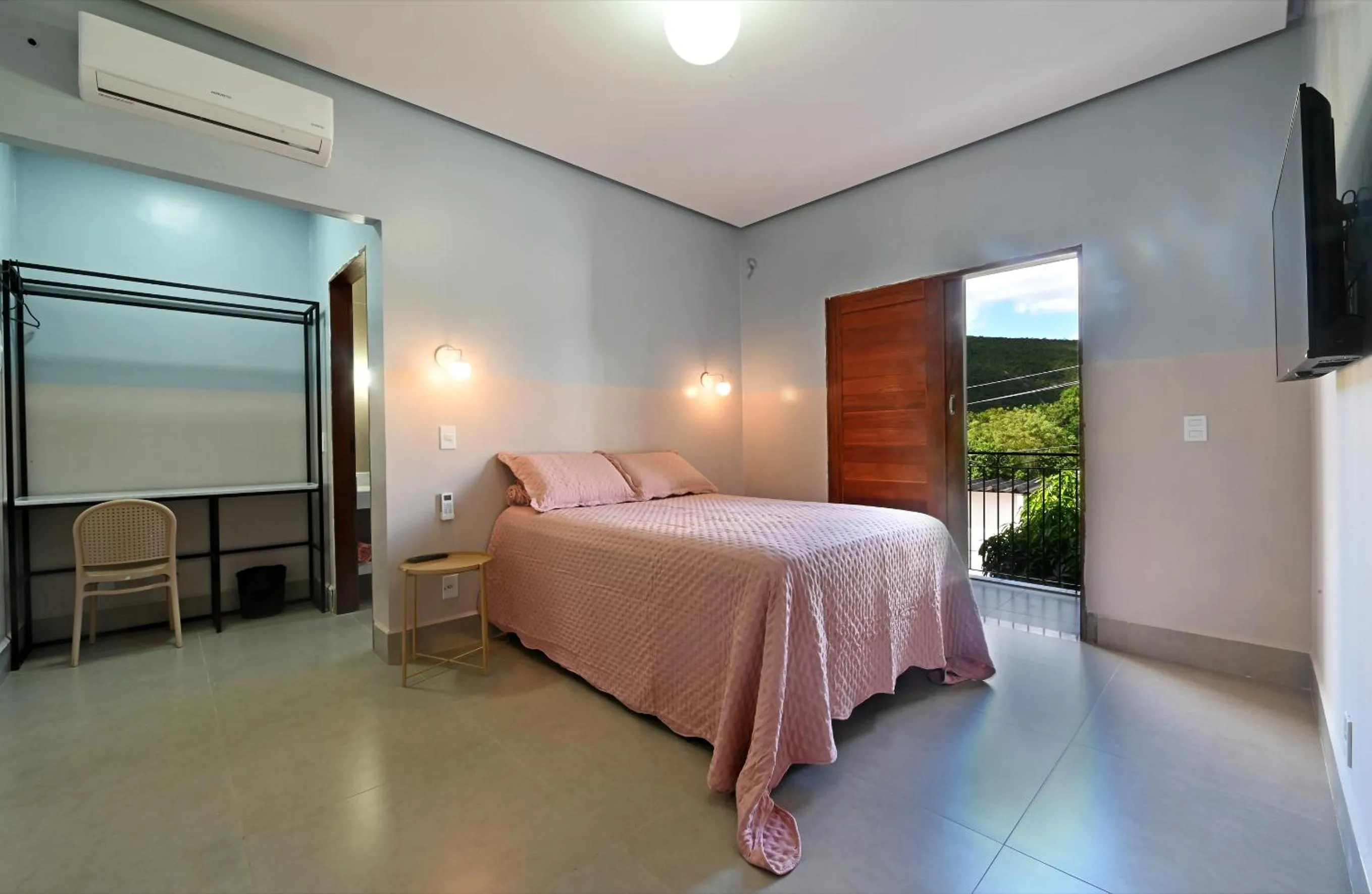 Bedroom, Bed in Hotel e Pousada O Casarão