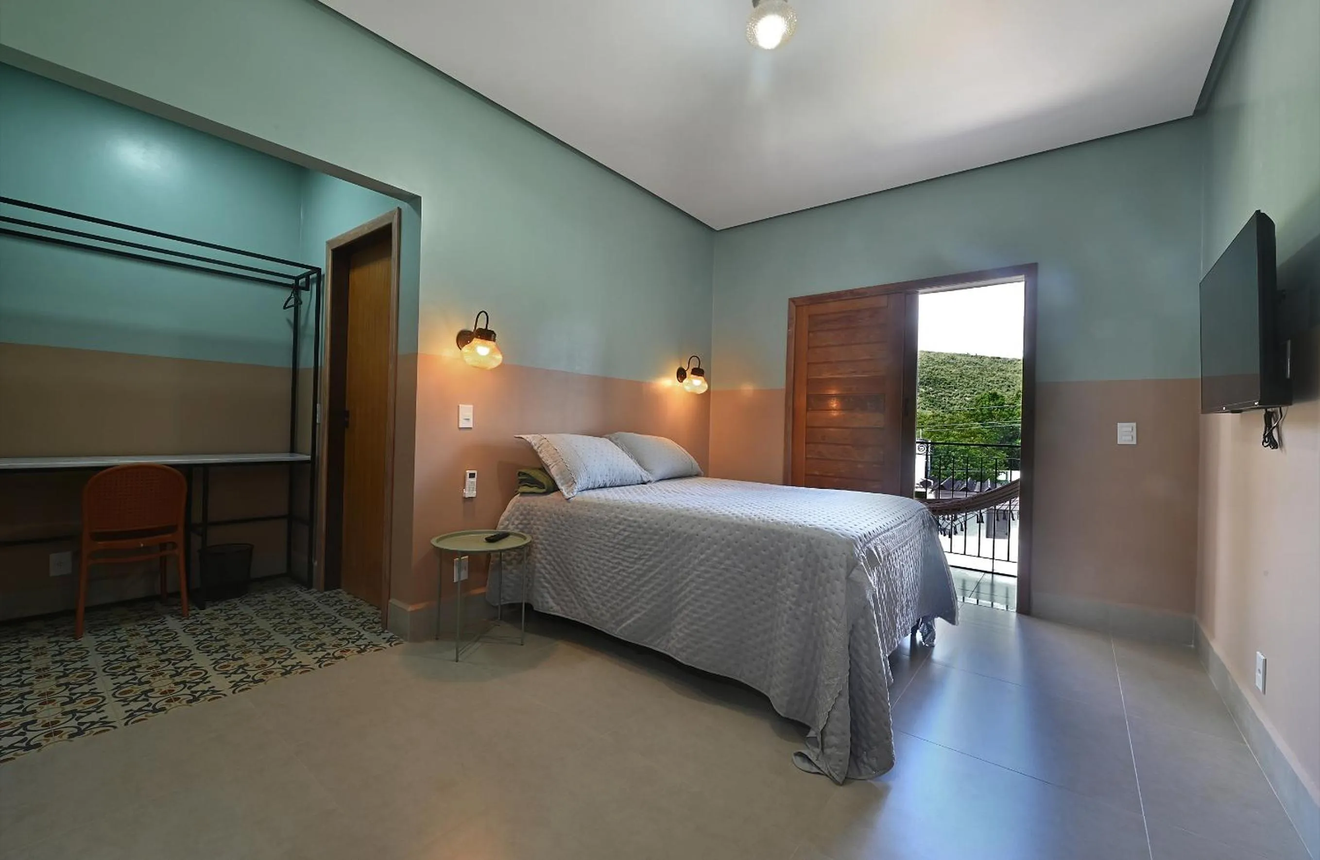 Bedroom, Bed in Hotel e Pousada O Casarão