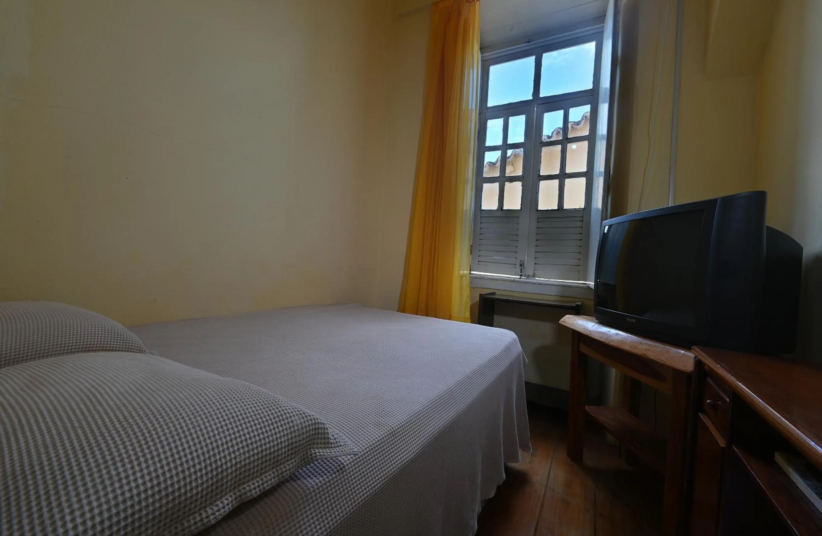 Bedroom, Bed in Hotel e Pousada O Casarão