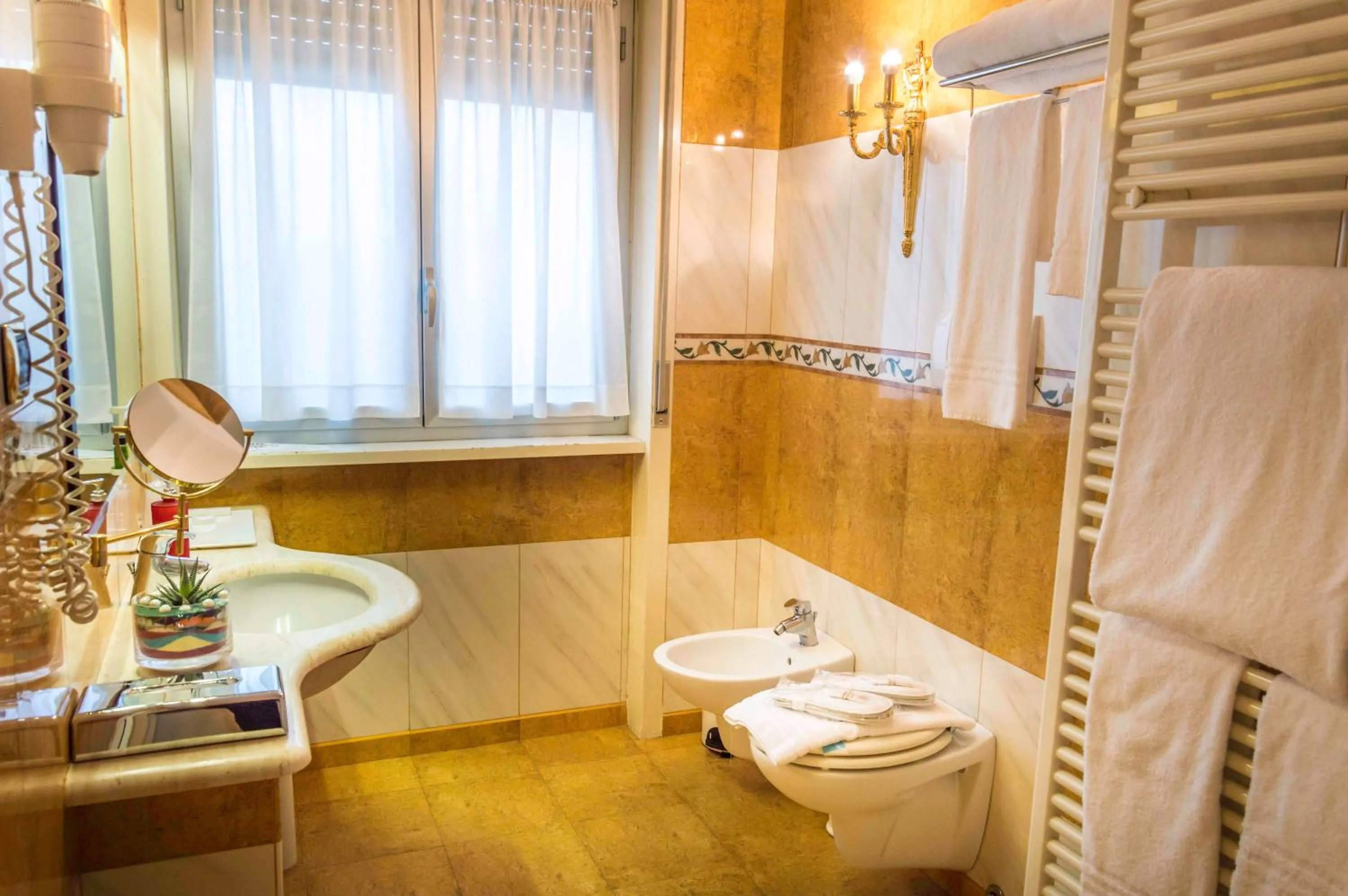 Bedroom in Hotel La Bussola