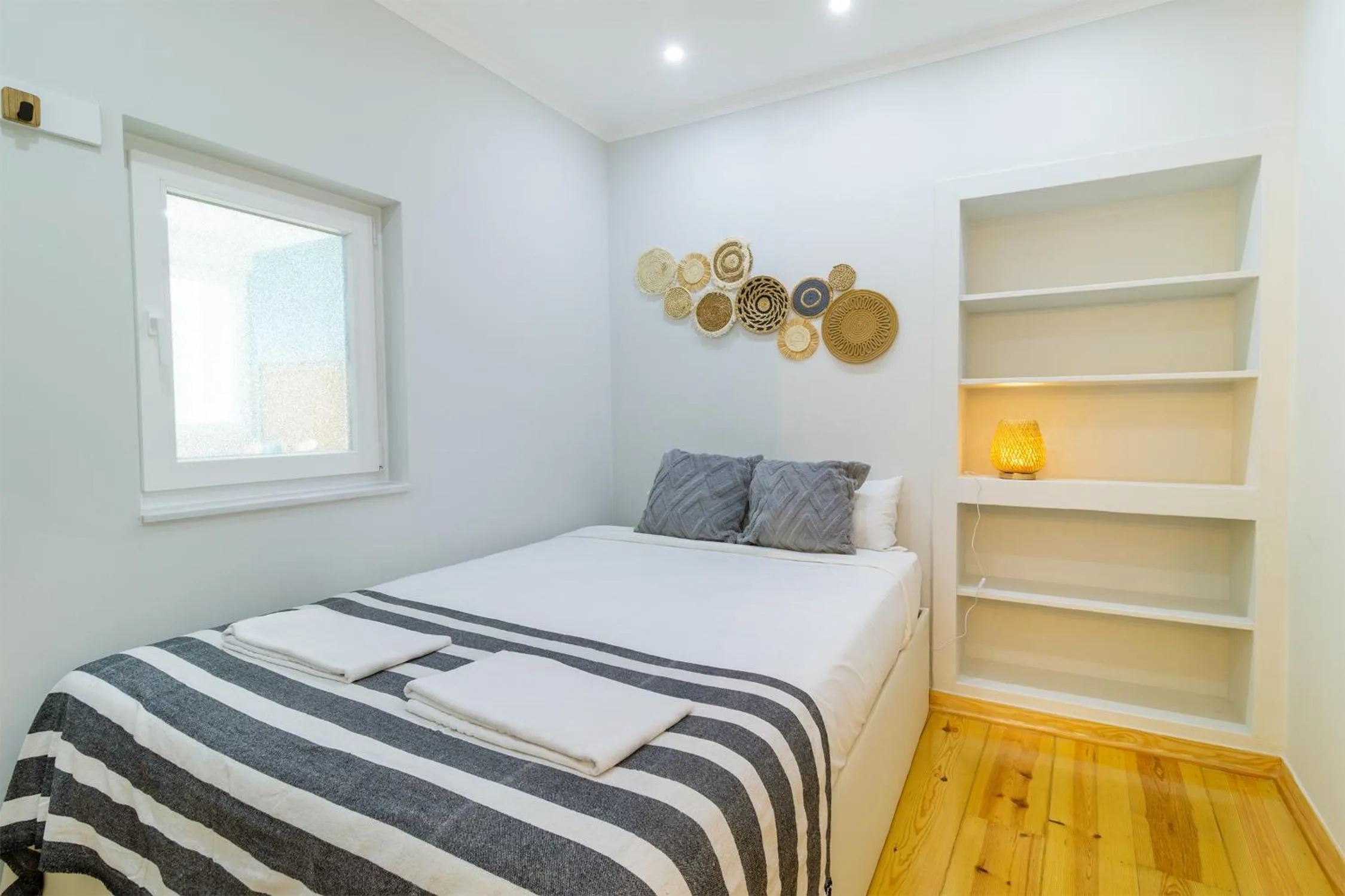 Bed in Diario de Noticias by Central Hill Apartments