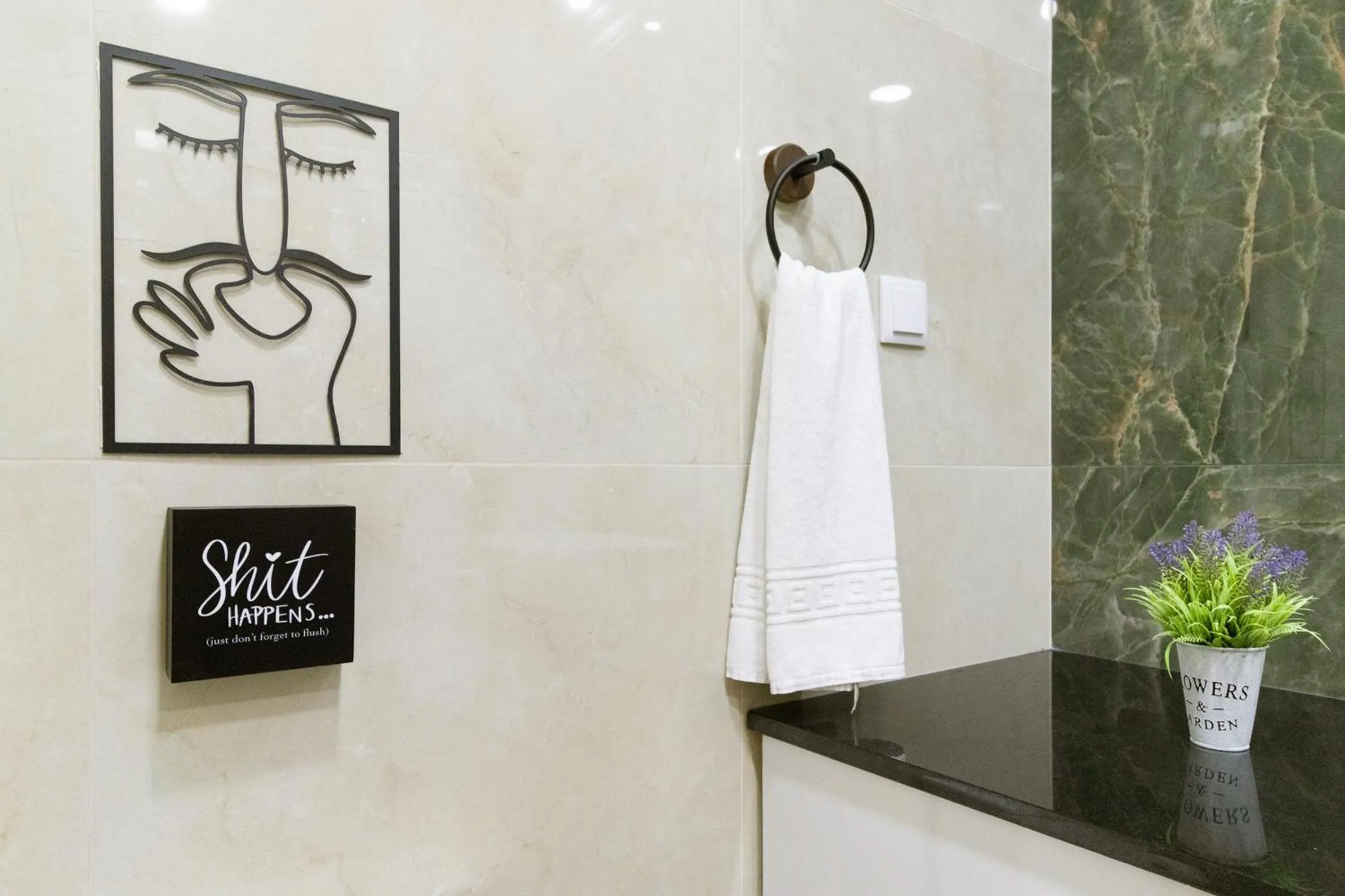 Bathroom in Diario de Noticias by Central Hill Apartments