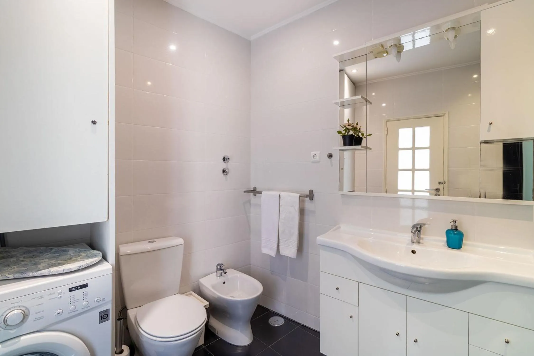 Bathroom in Diario de Noticias by Central Hill Apartments