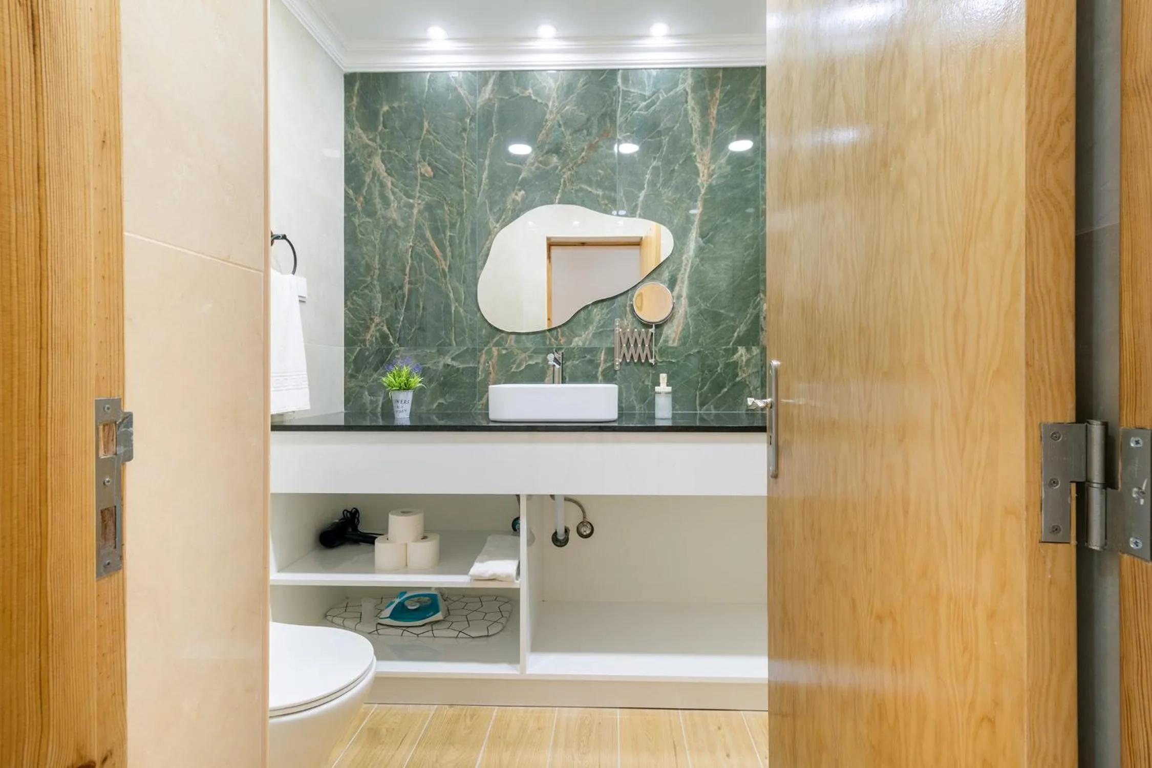 Bathroom in Diario de Noticias by Central Hill Apartments