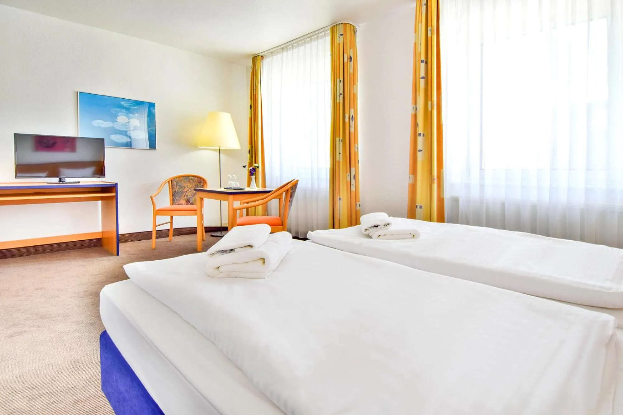 Photo of the whole room, Bed in Strandhotel Bansiner Hof