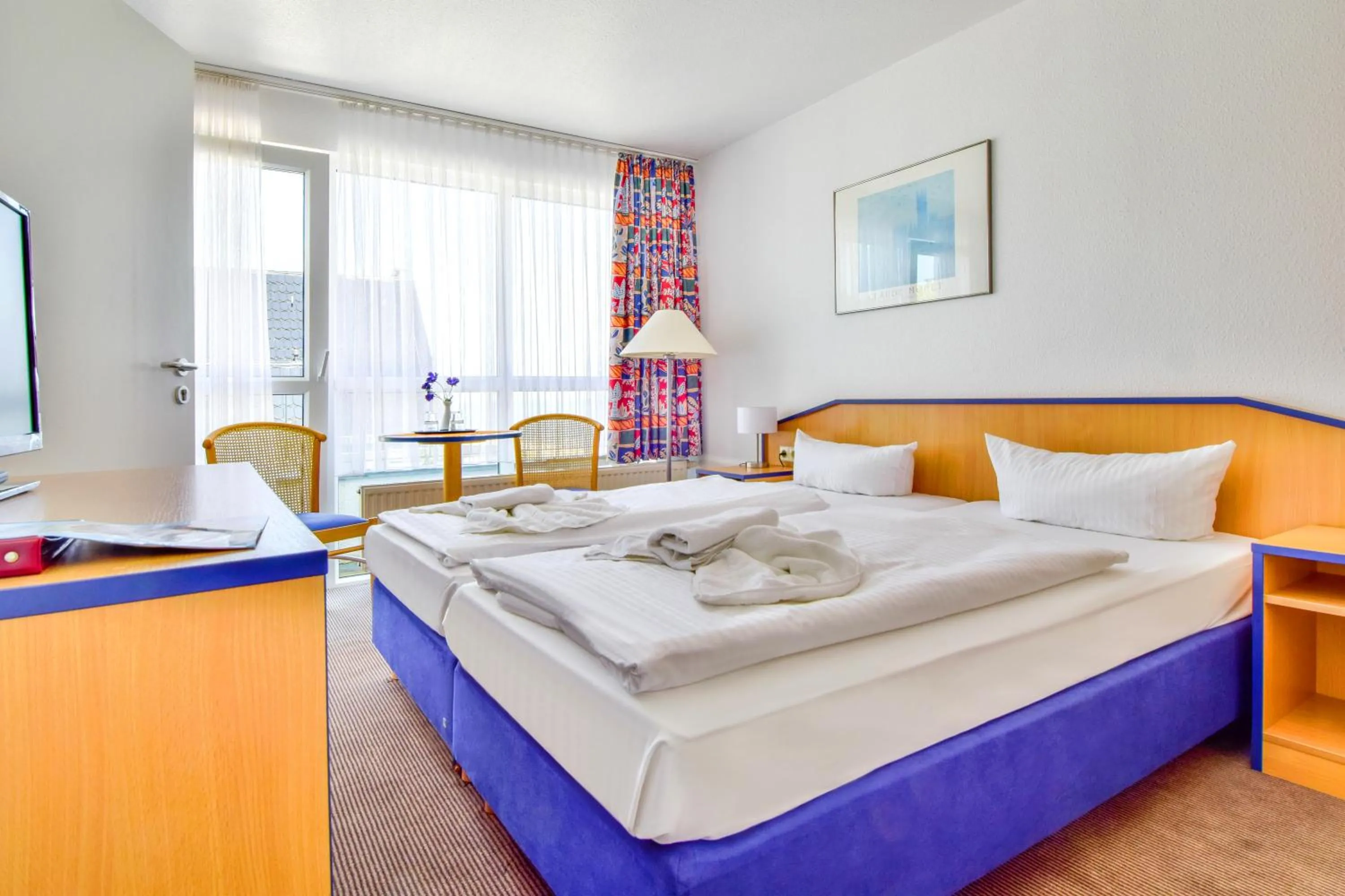 Photo of the whole room, Bed in Strandhotel Bansiner Hof