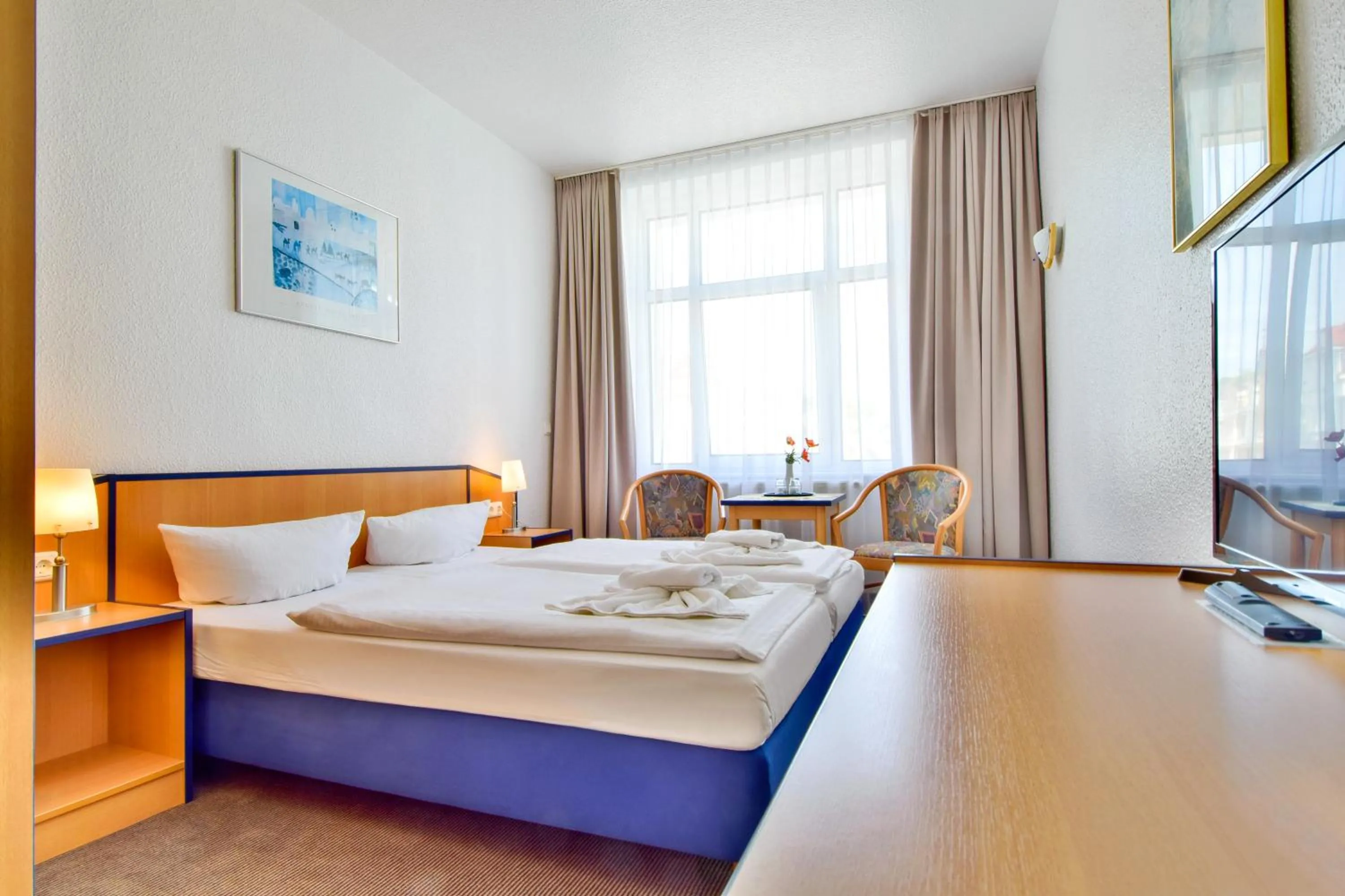 Photo of the whole room, Bed in Strandhotel Bansiner Hof
