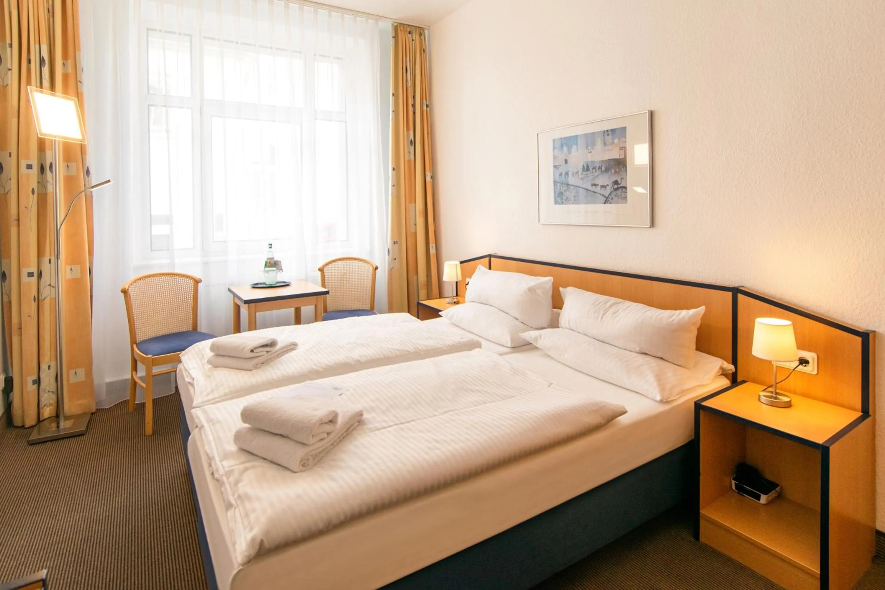 Photo of the whole room, Bed in Strandhotel Bansiner Hof
