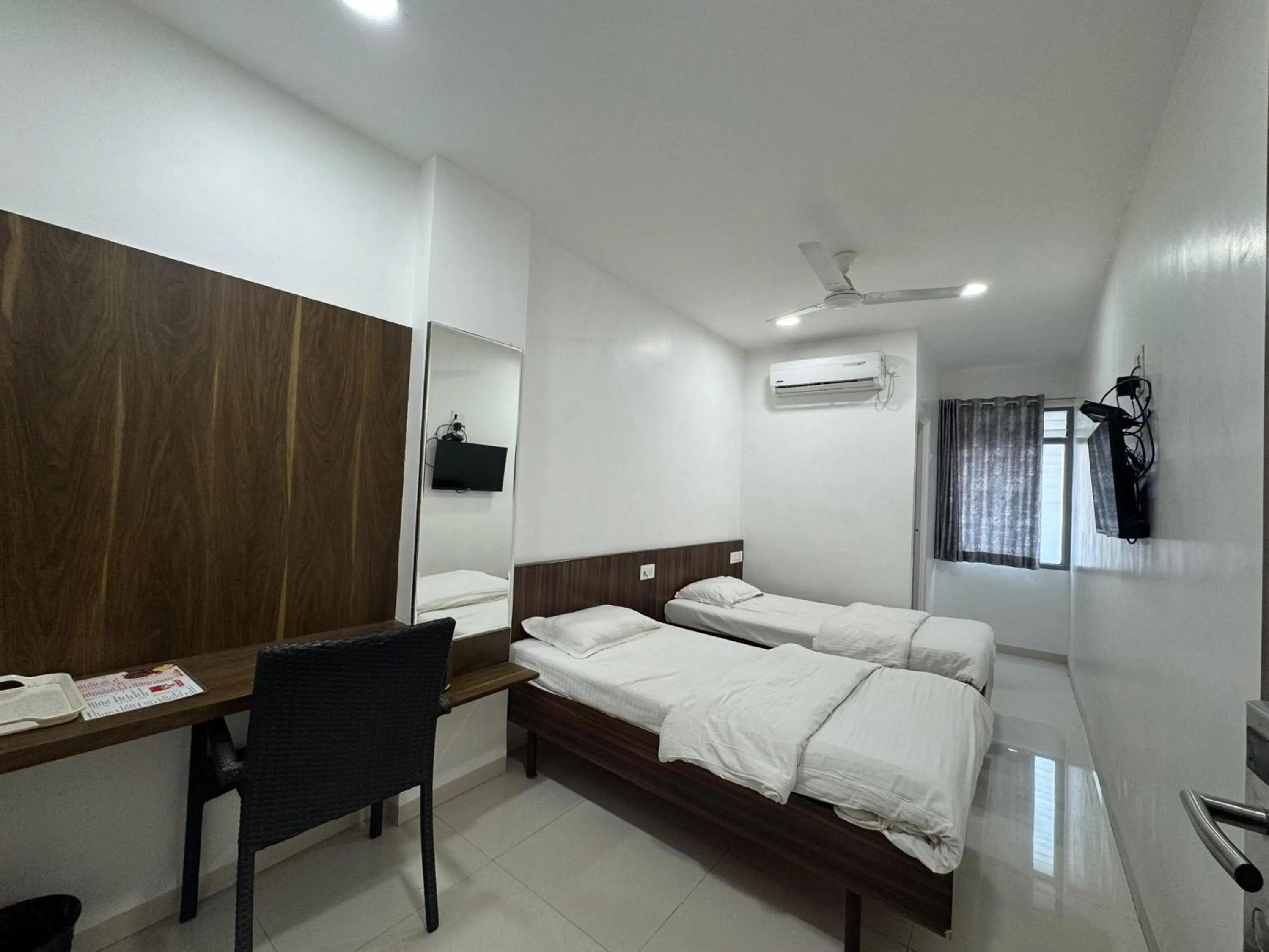 Bed in Hotel New Samrat