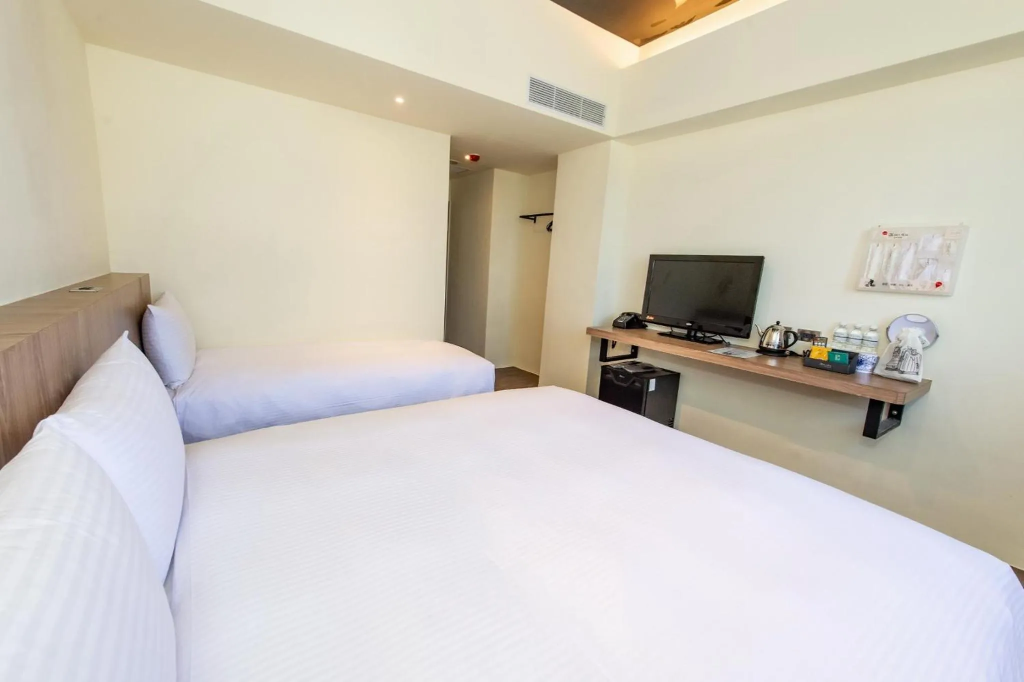 Bed in Traveller Inn Tiehua Cultural and Creative Hotel II