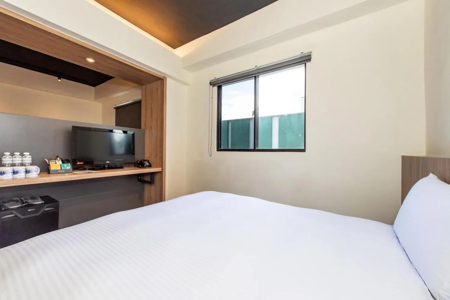 Bed in Traveller Inn Tiehua Cultural and Creative Hotel II