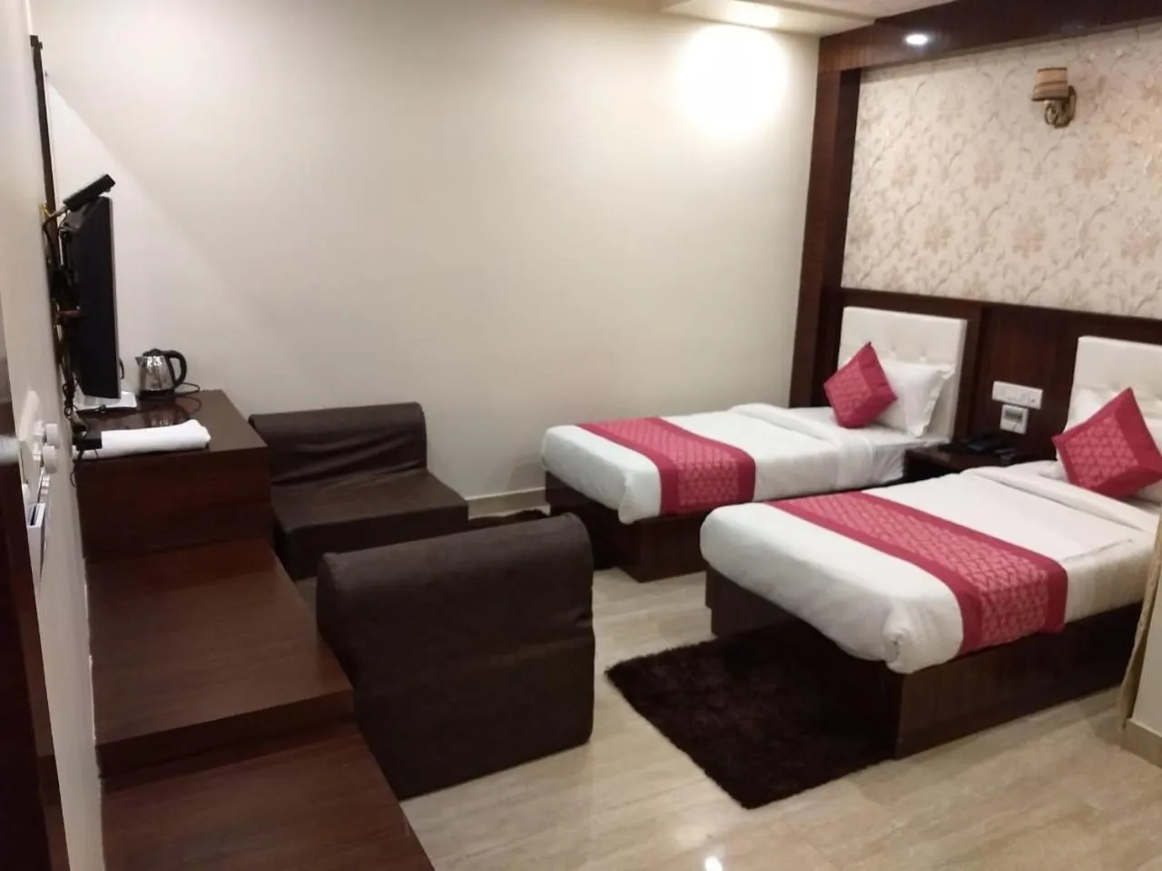 Bed in Hotel Rahil Palace