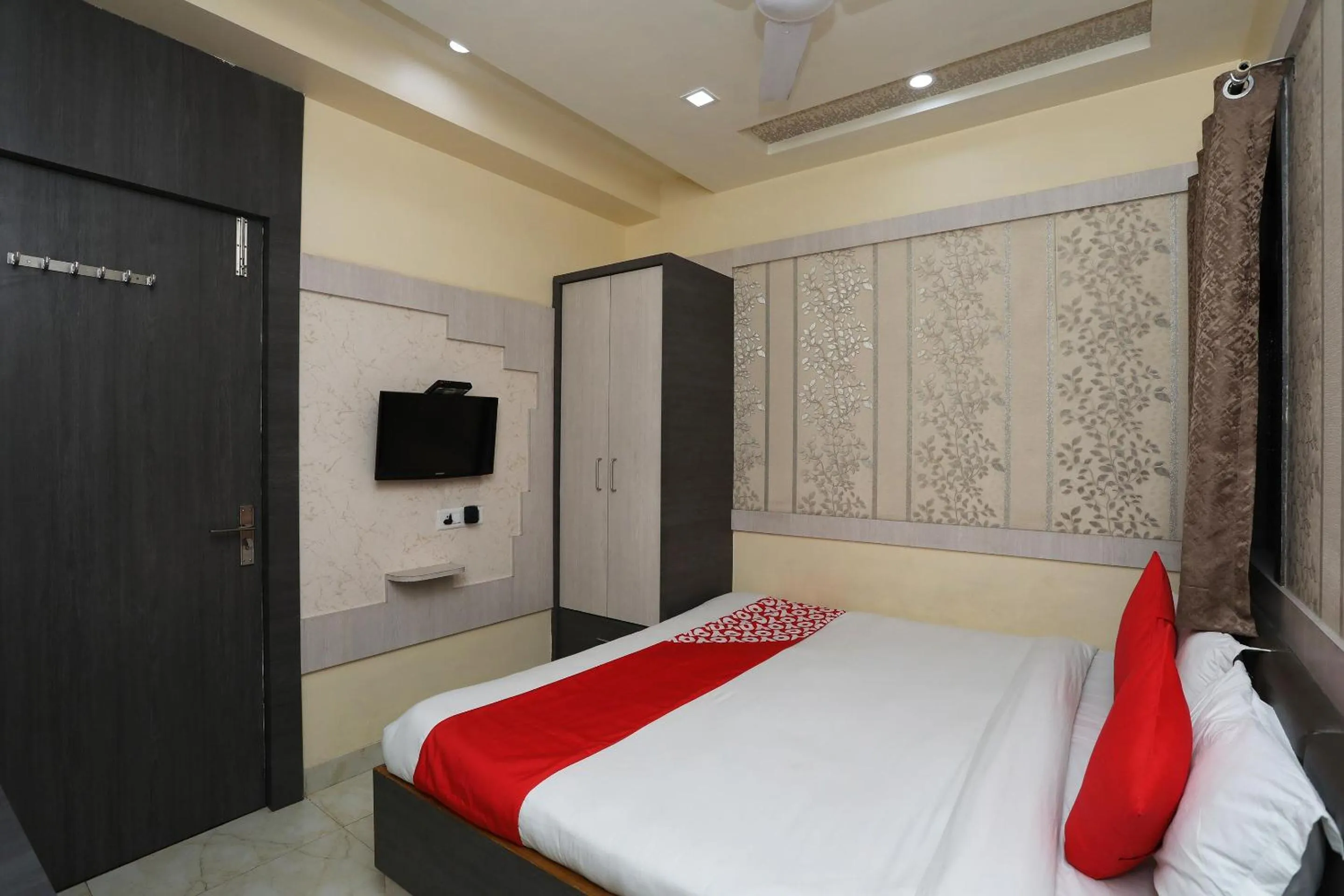 Bed in Hotel Rahil Palace