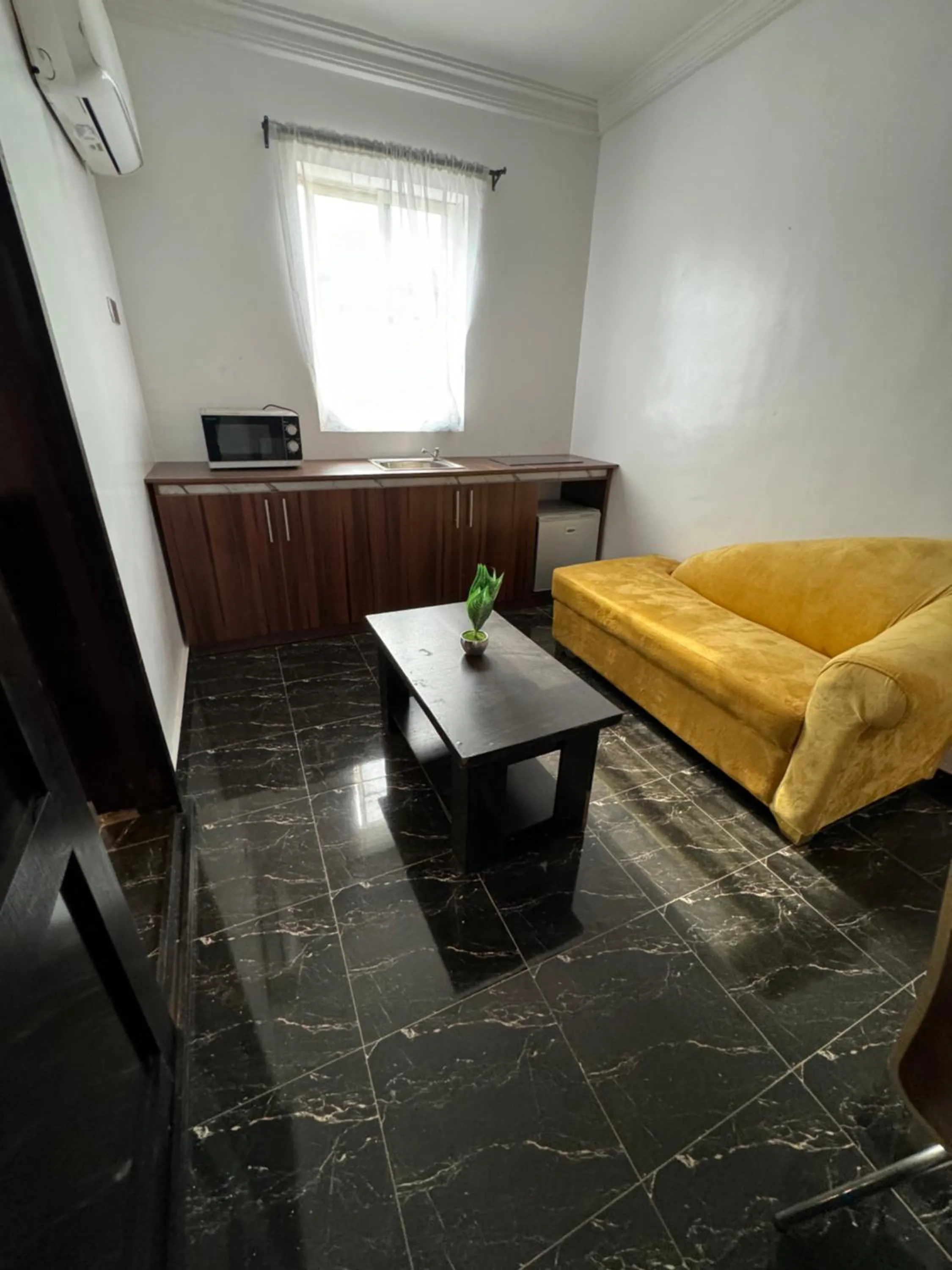 Living room in Posh Hotel and Suites Ikeja