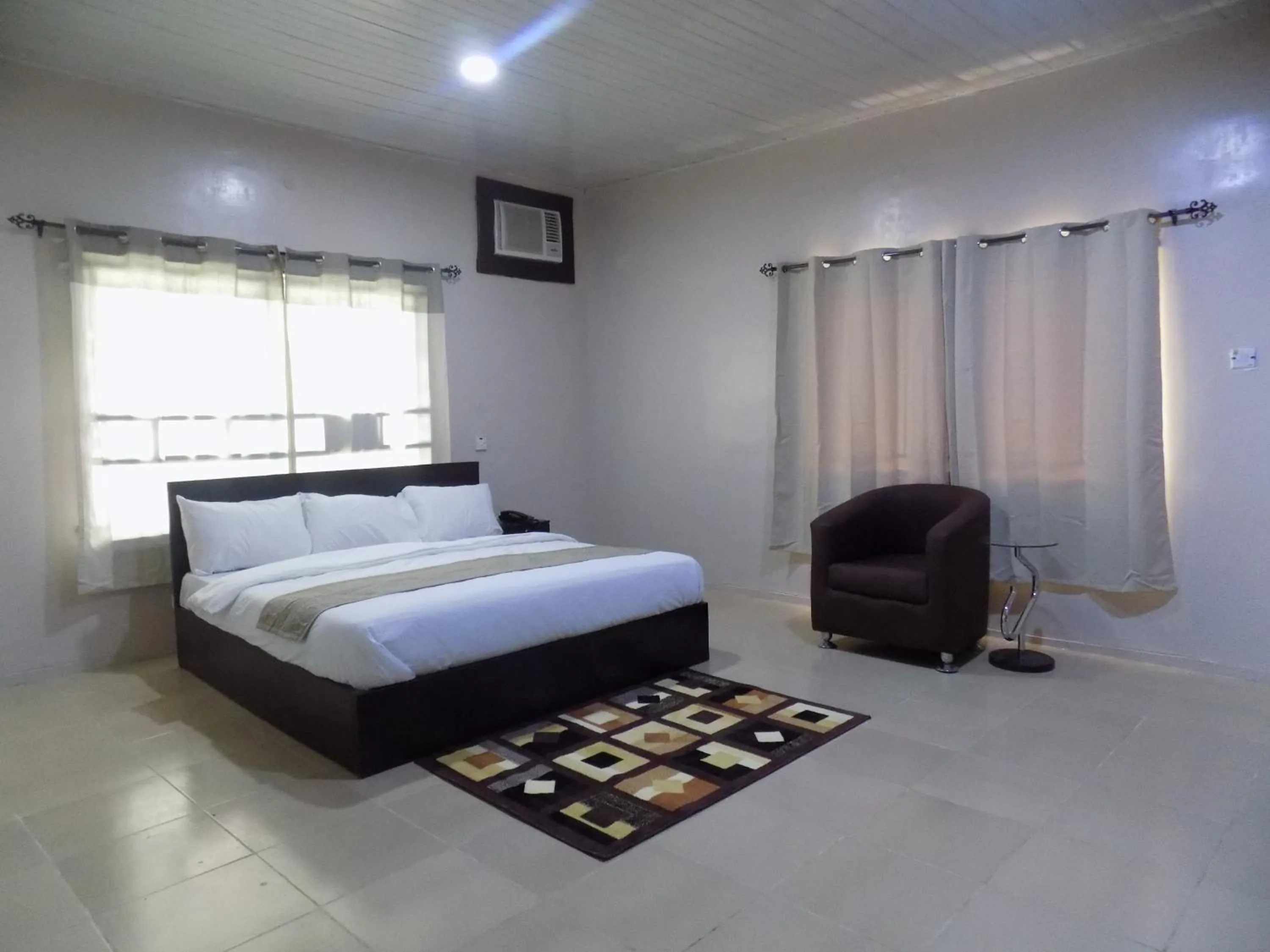 Bedroom, Bed in Posh Hotel and Suites Ikeja