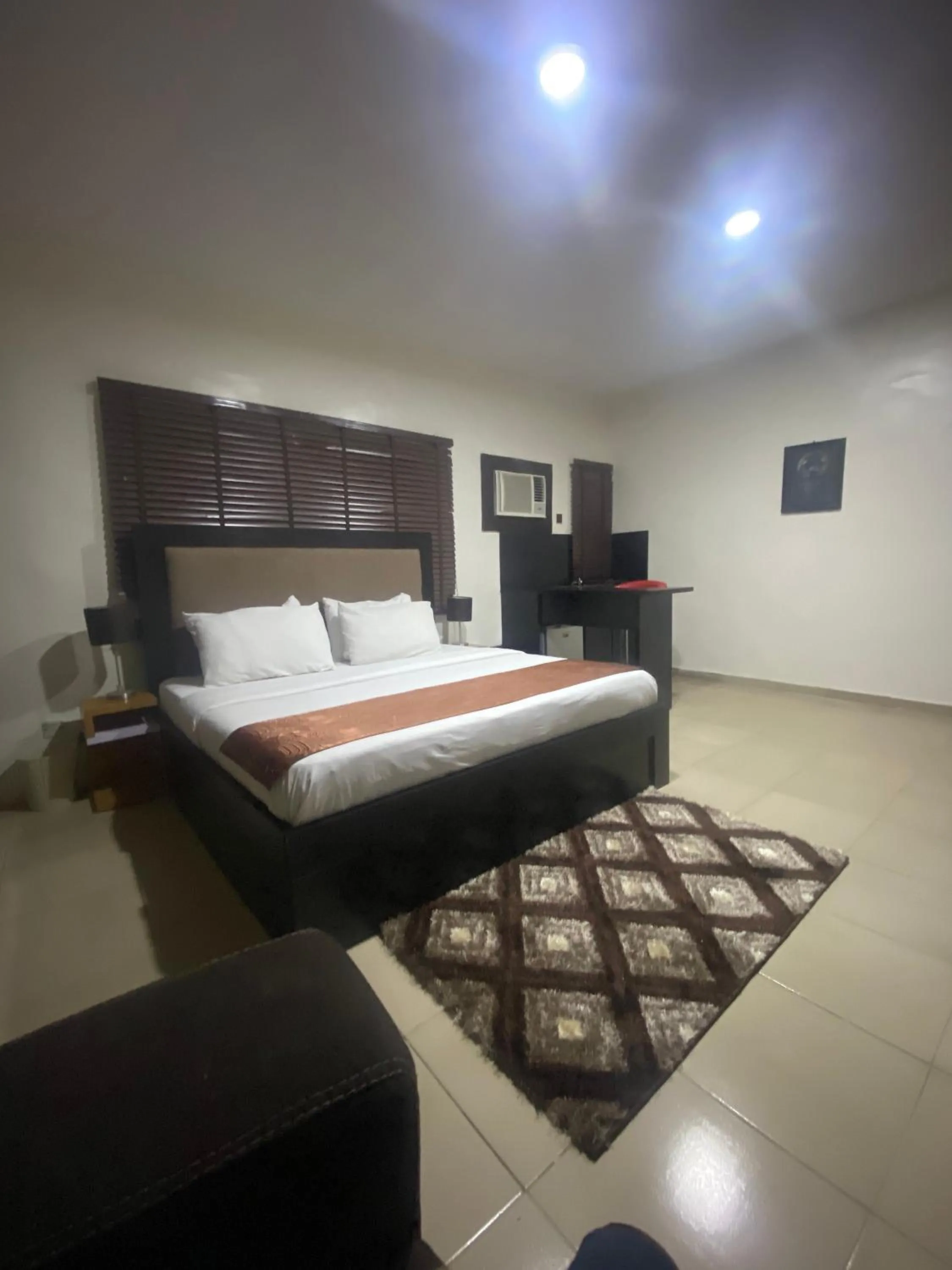 Photo of the whole room, Bed in Posh Hotel and Suites Ikeja