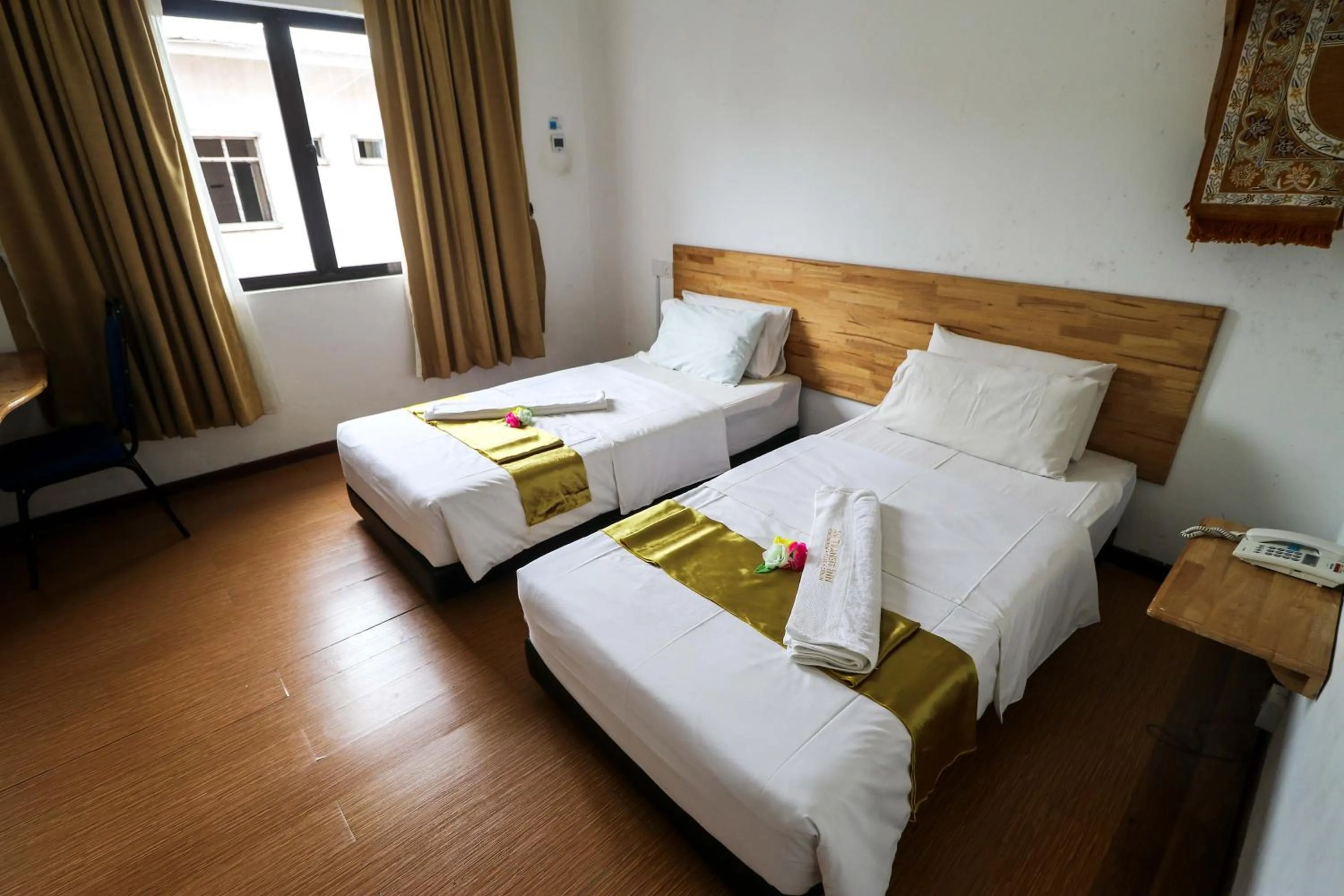 Bed in AM Transit Inn Kuala Terengganu