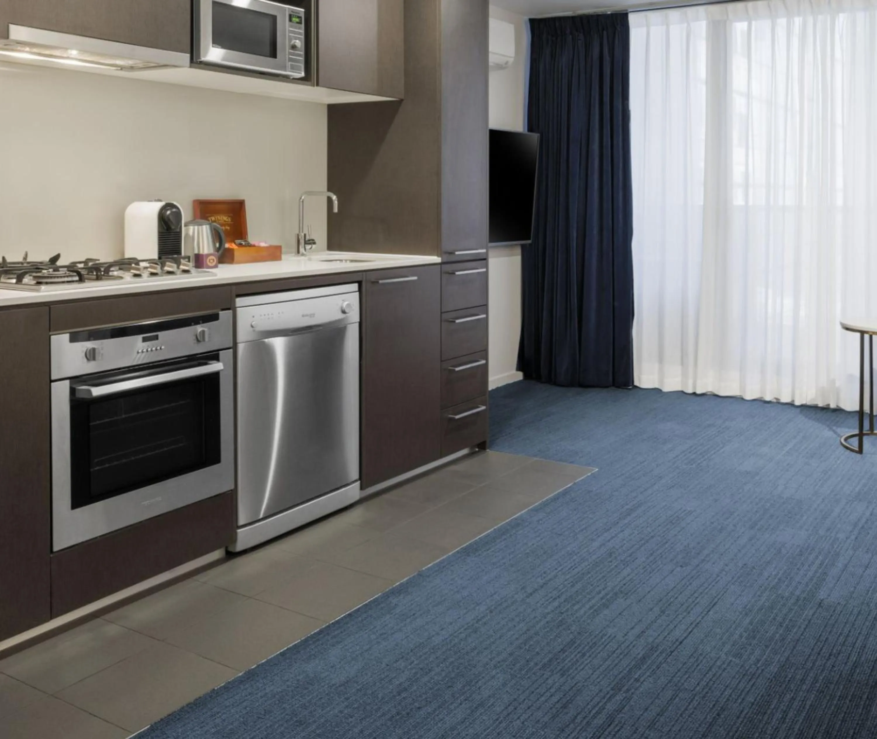Kitchen or kitchenette in Avani Melbourne Jazz Corner Residences