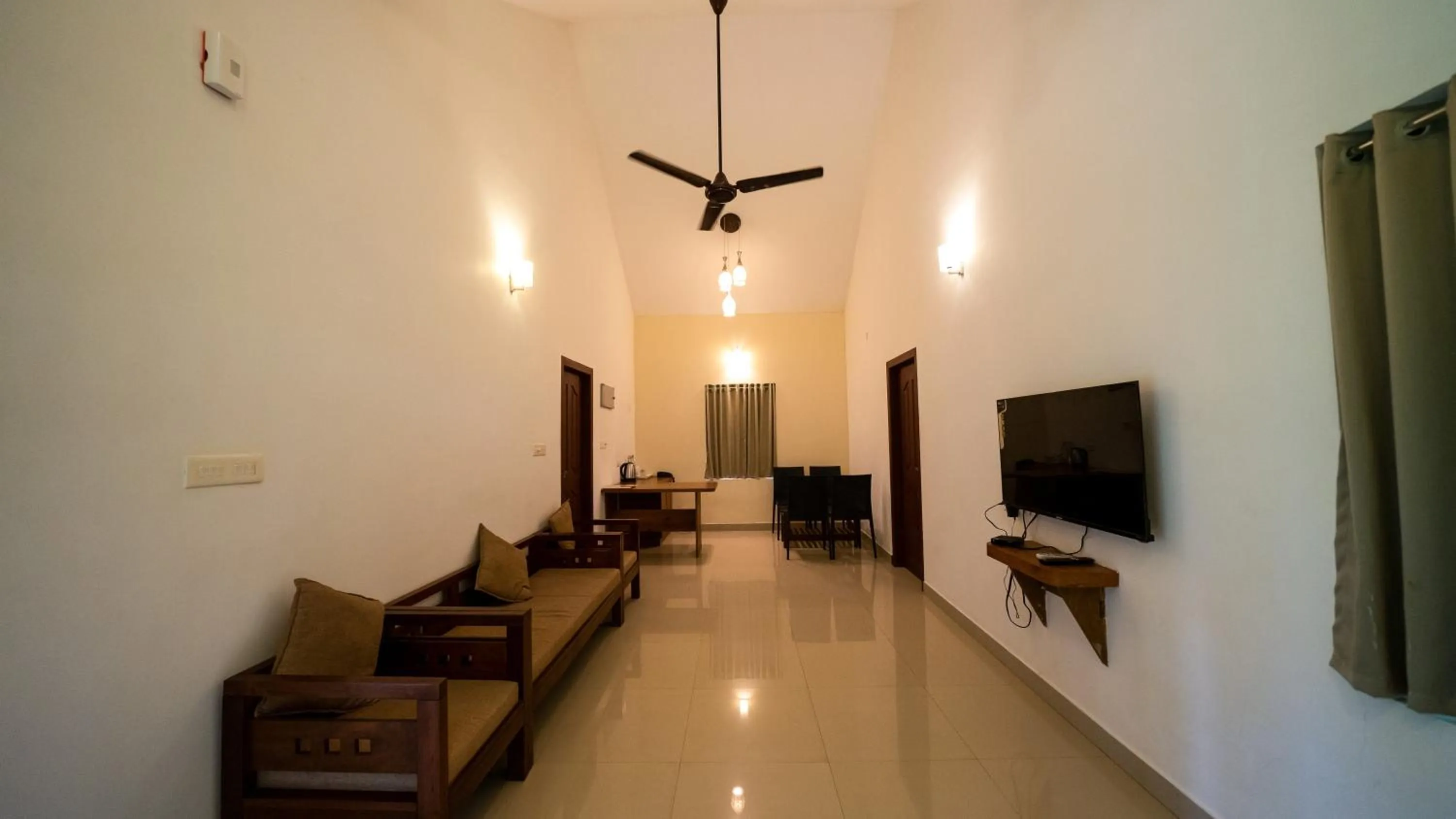 TV and multimedia in Vythiri Holiday Resort, Wayanad