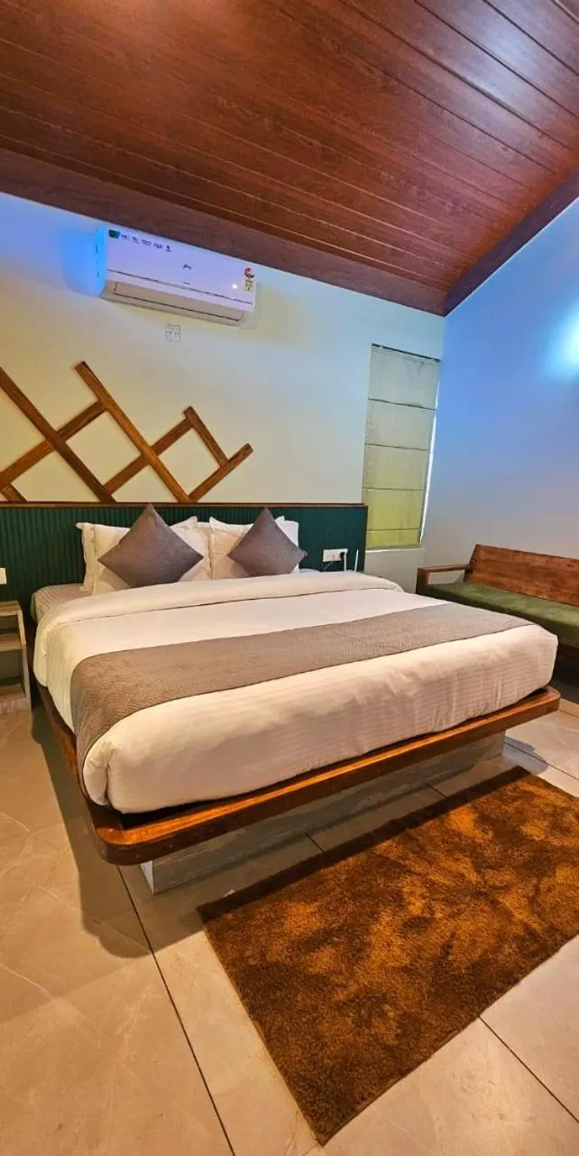 Bed in Vythiri Holiday Resort, Wayanad