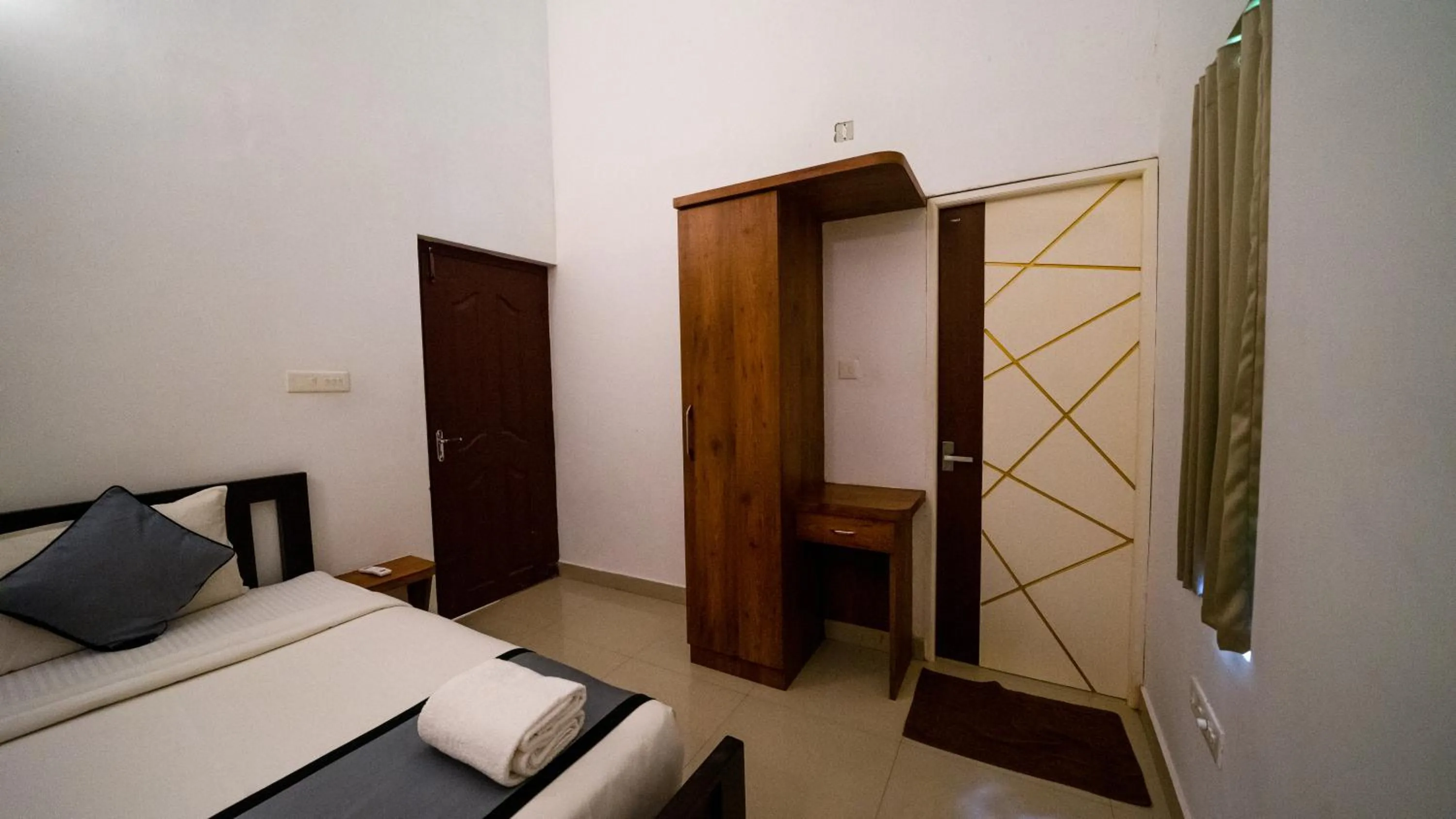 Bed in Vythiri Holiday Resort, Wayanad