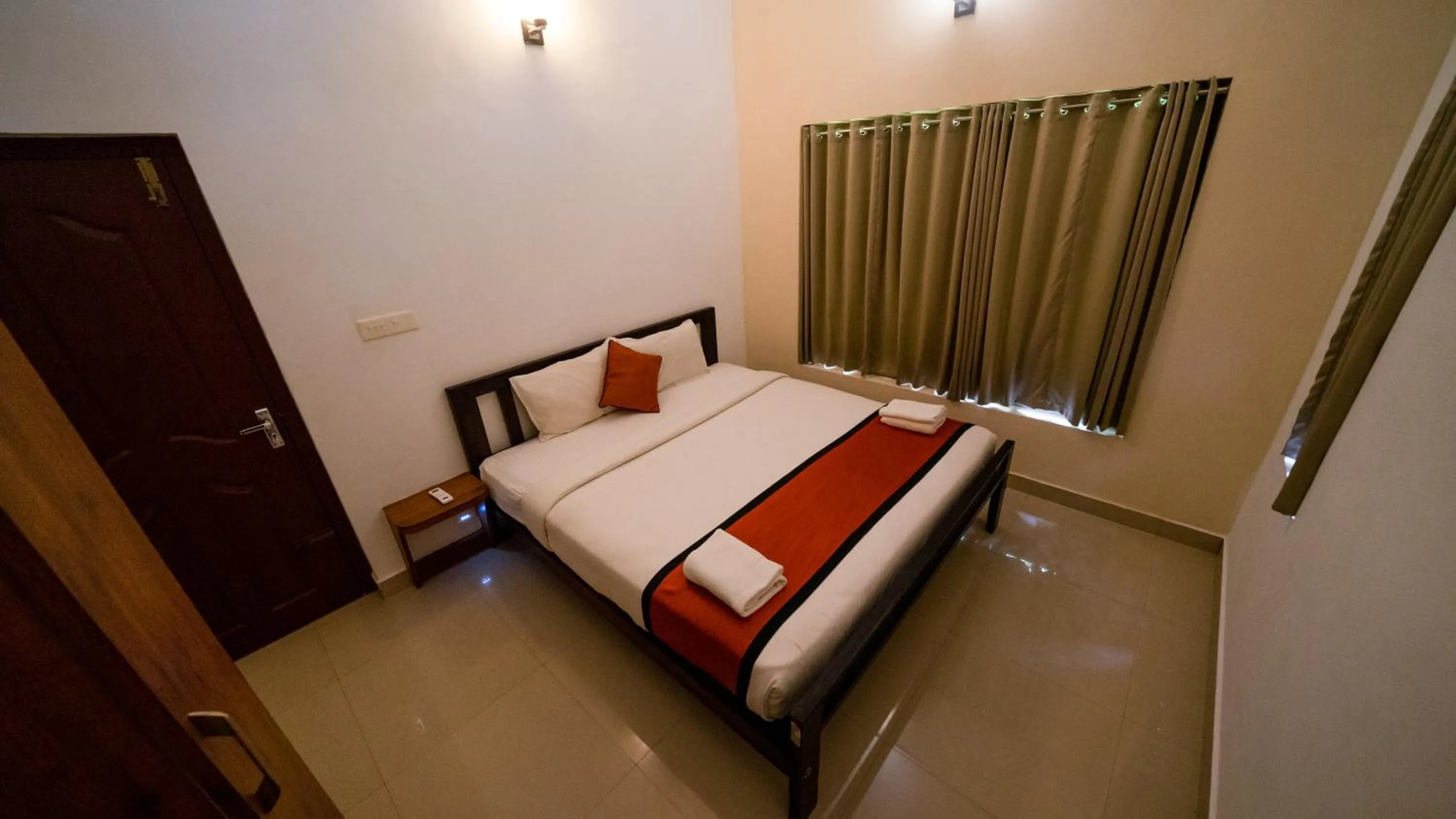 Bed in Vythiri Holiday Resort, Wayanad