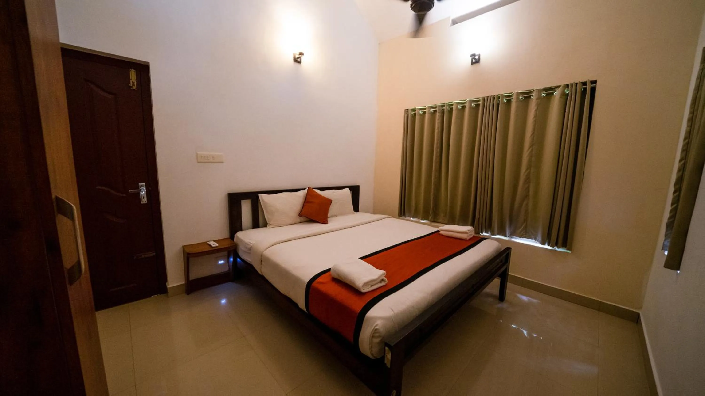 Bed in Vythiri Holiday Resort, Wayanad